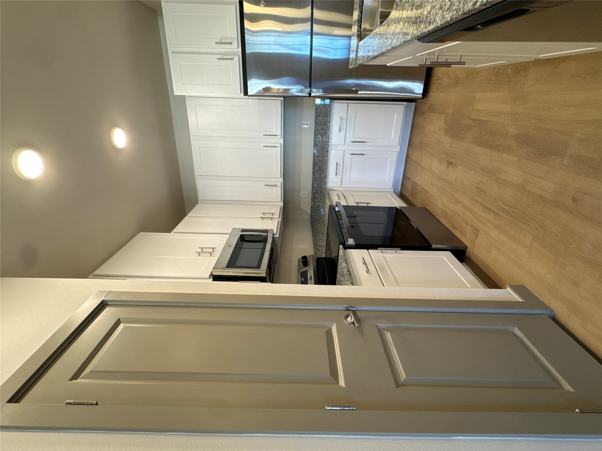 691 Union Chapel Road, Unit A2 Cedar Creek, TX 78612 - Photo 6 of 21 a kitchen with a sink cabinets stainless steel appliances and a window