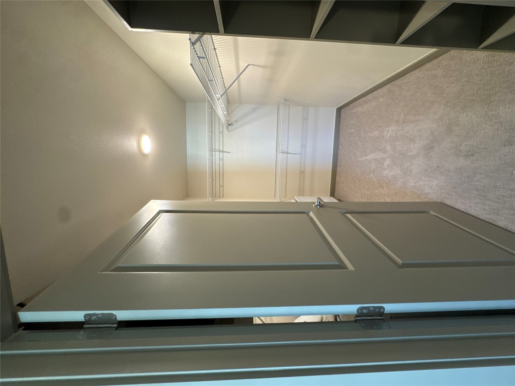 691 Union Chapel Road, Unit A2 Cedar Creek, TX 78612 - Photo 10 of 21 Spacious closet with carpet