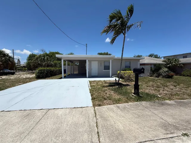 a view of a house with a patio