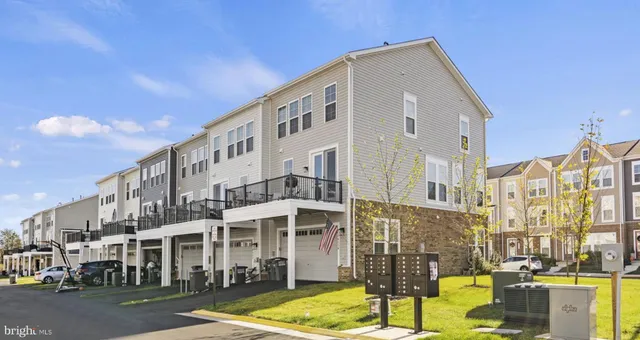 a front view of a building with glass windows