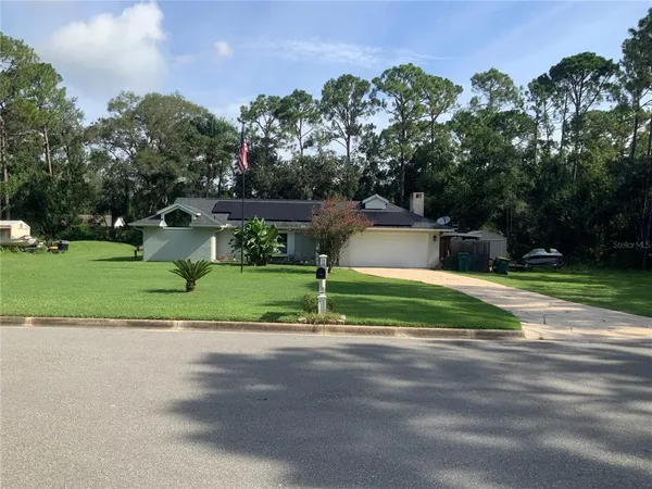a garden view with a entertaining space