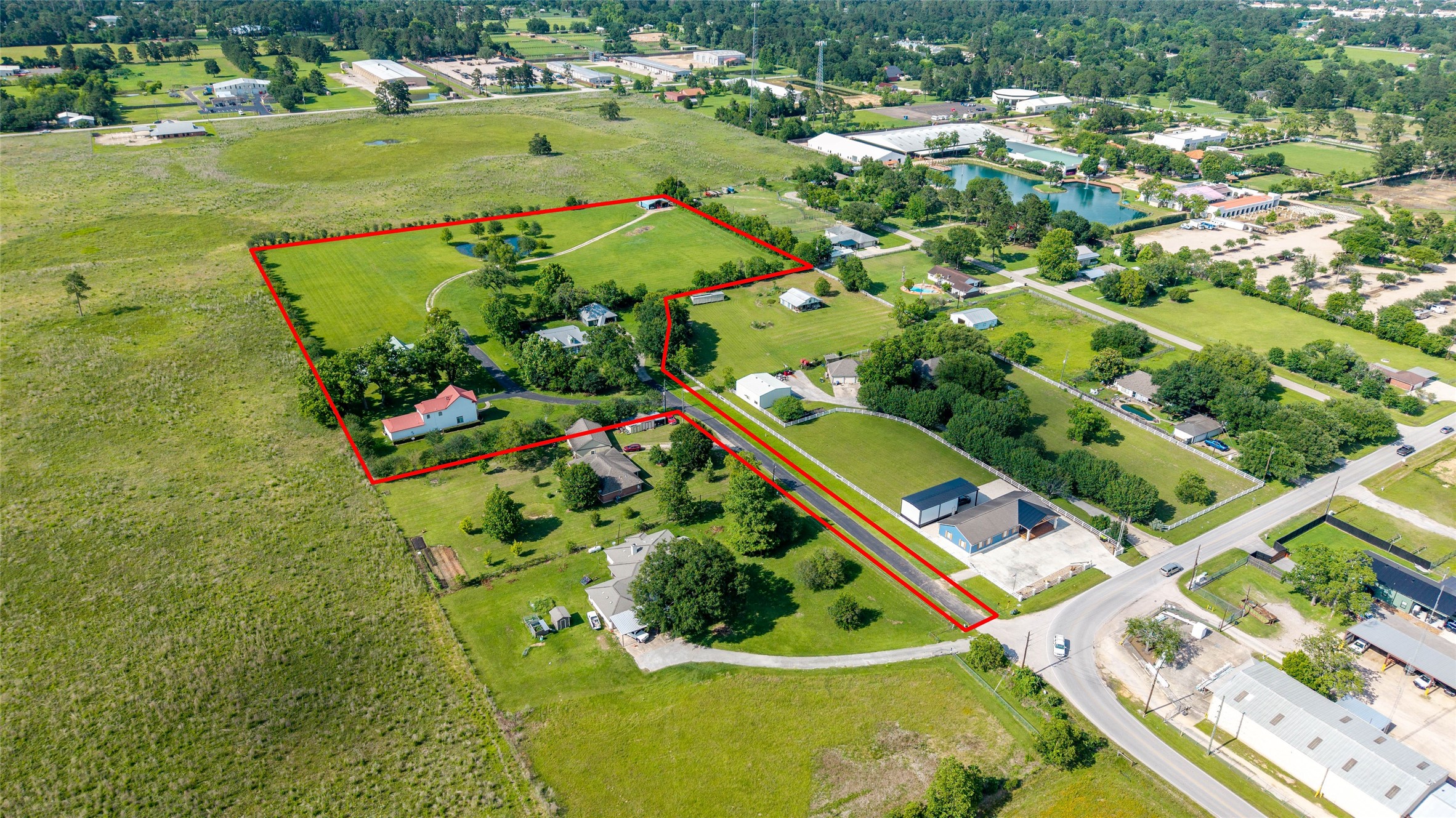 26631 Decker Prairie-Rosehill Road Magnolia, TX 77355 - Photo 19 of 20 an aerial view of a residential houses with outdoor space and swimming pool