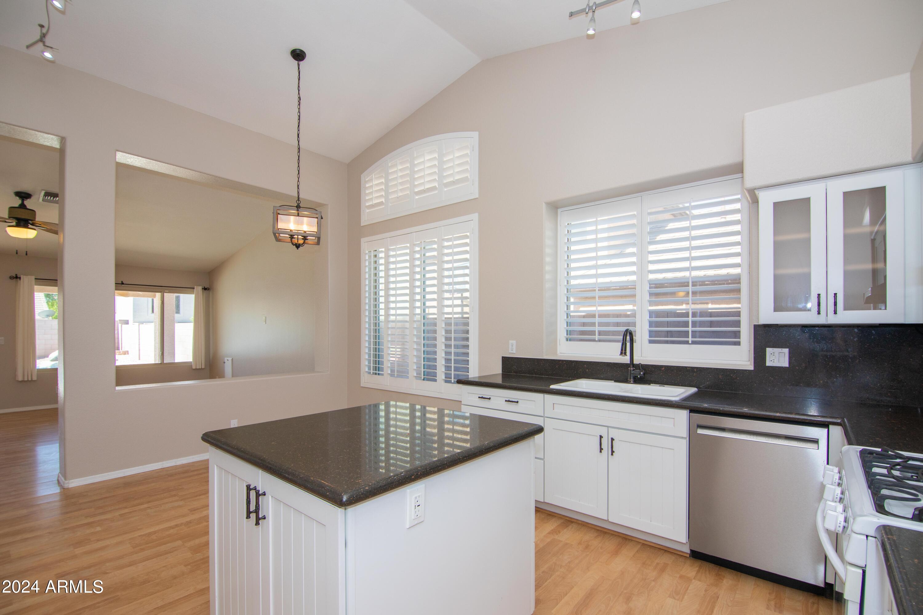 4609 East Rowel Road Phoenix, AZ 85050 - Photo 13 of 61 Kitchen to Family Room