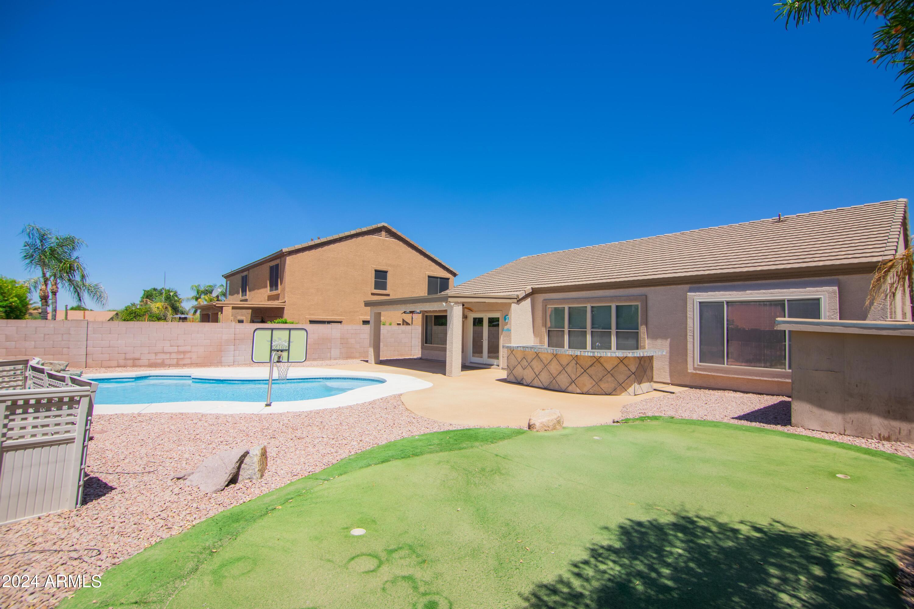 4609 East Rowel Road Phoenix, AZ 85050 - Photo 59 of 61 Putting Green to Storage, Bar & Pool