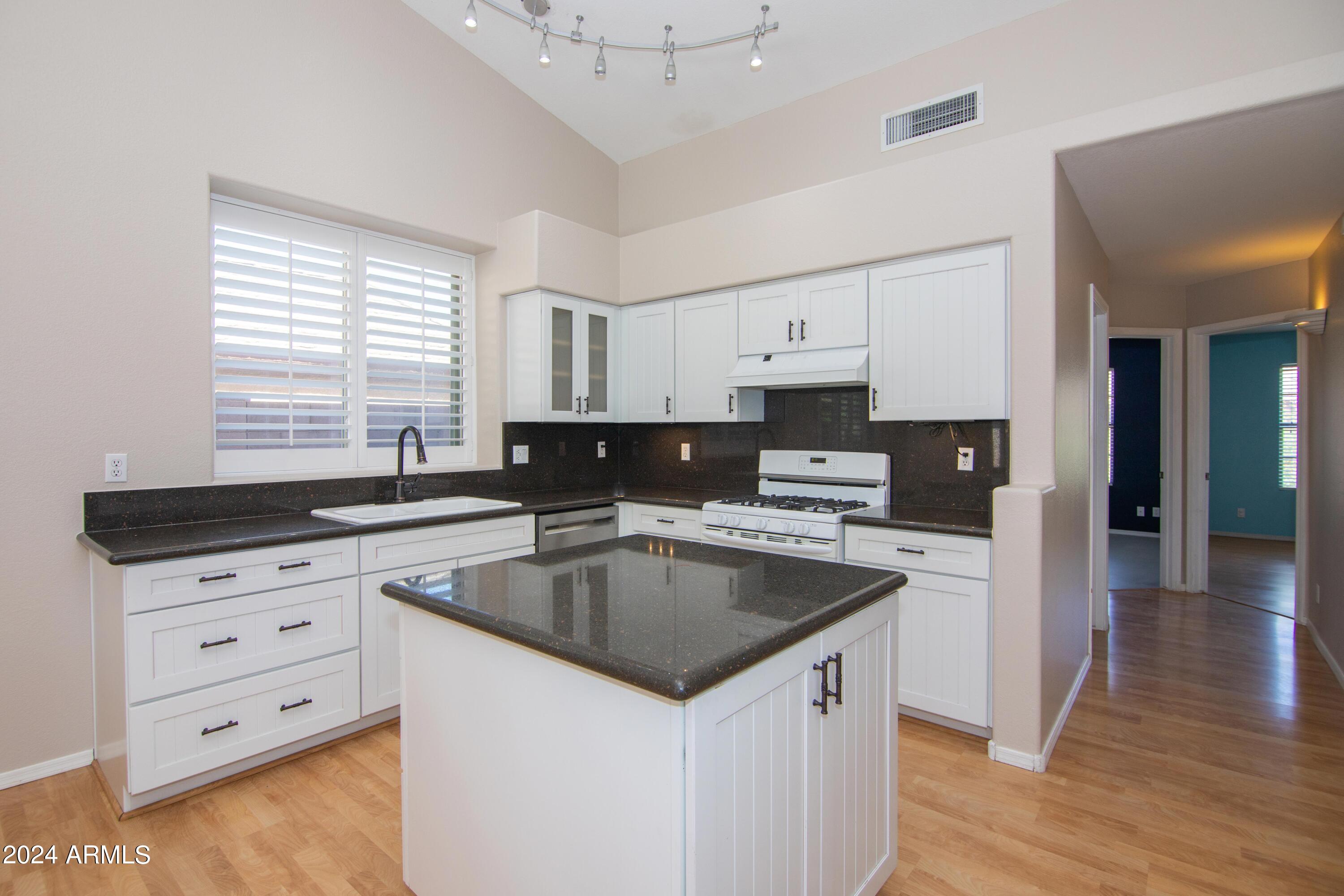 4609 East Rowel Road Phoenix, AZ 85050 - Photo 9 of 61 Kitchen to Additional Beds & Bath