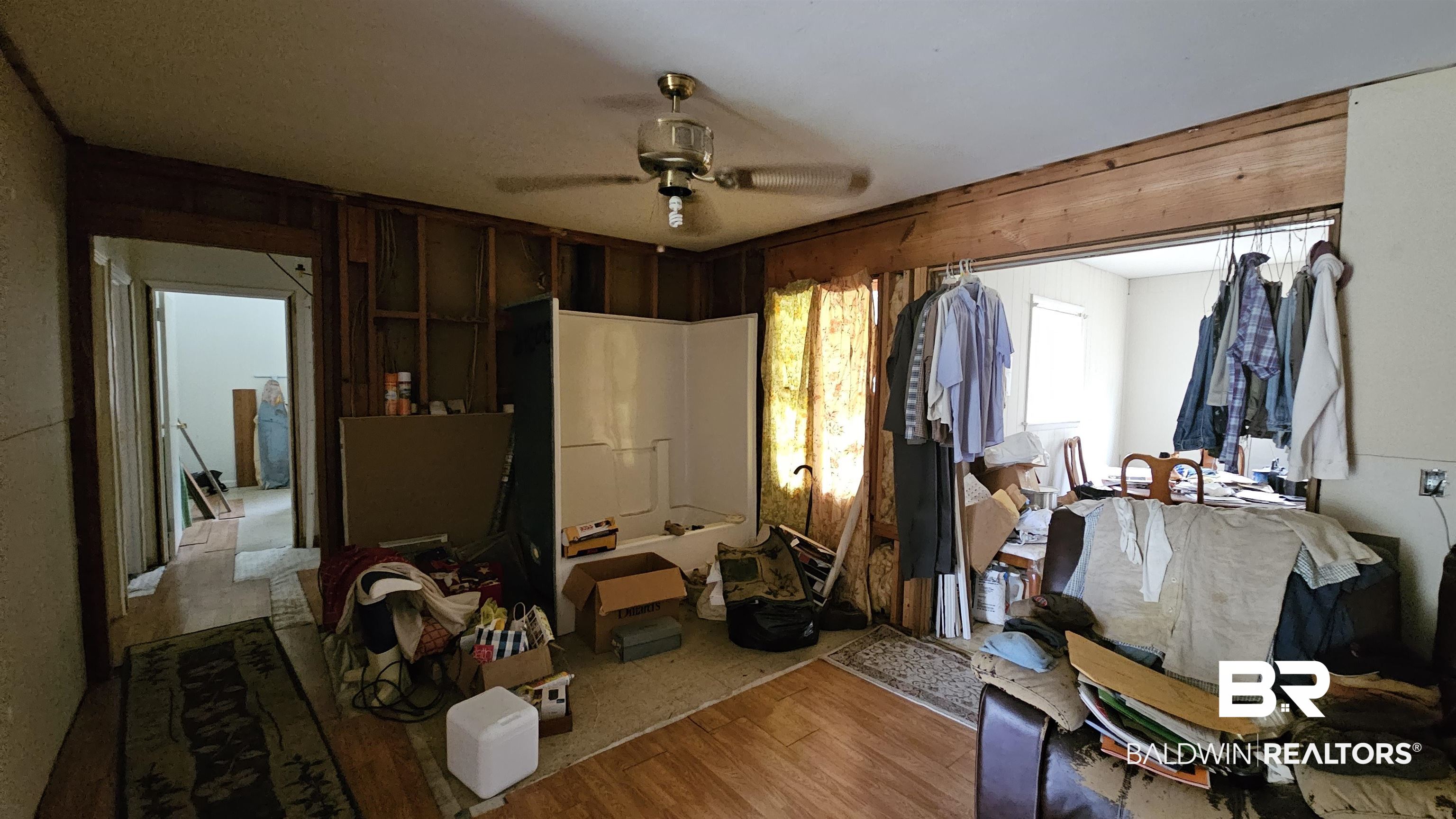 216 6th Avenue Atmore, AL 36502 - Photo 6 of 34 Interior space featuring ceiling fan and light wood-type flooring