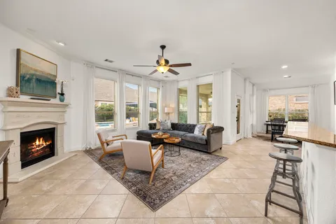a kitchen with stainless steel appliances granite countertop wooden cabinets sink and stove