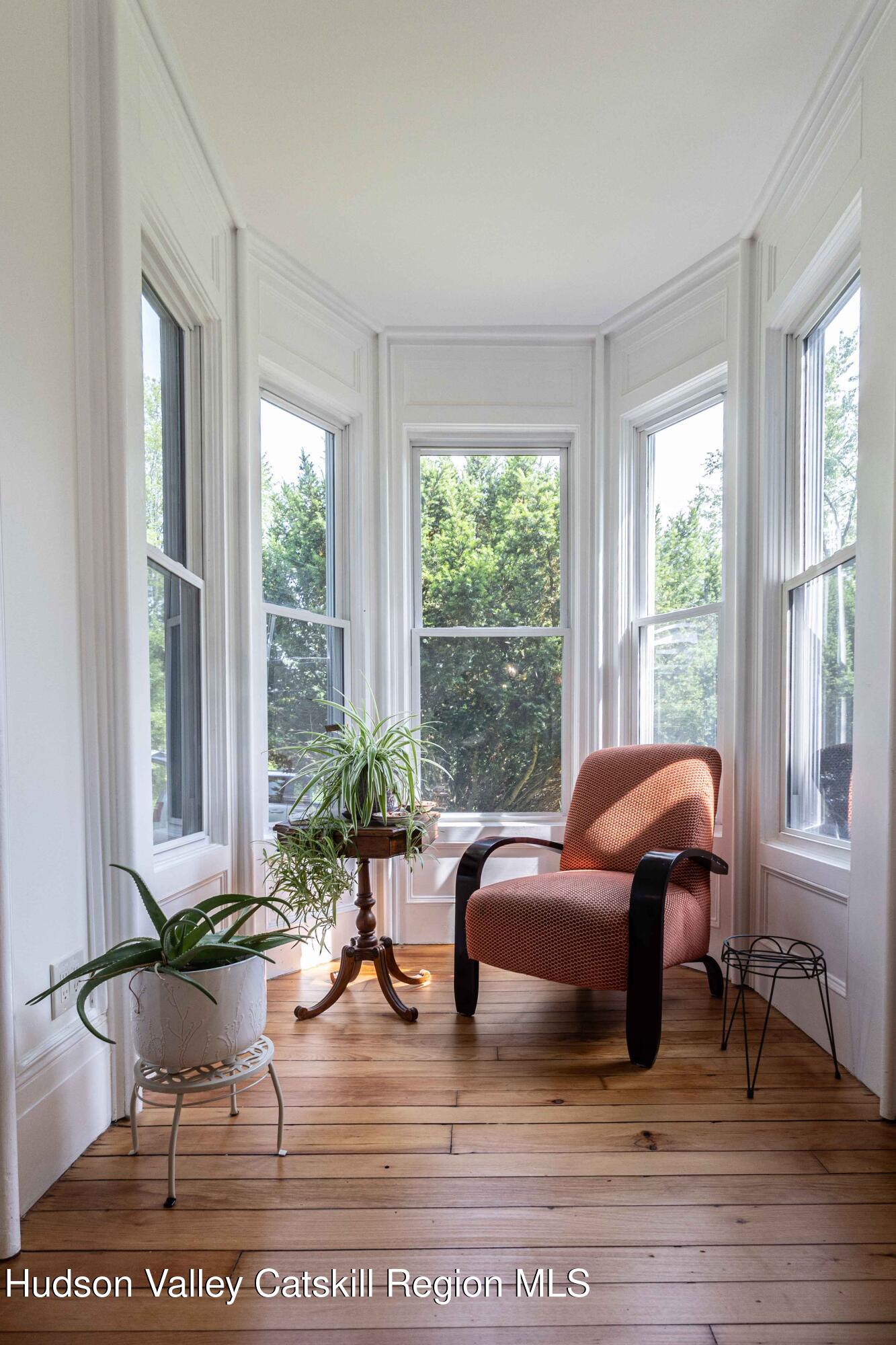 472 Lefever Falls Road Rosendale, NY 12401 - Photo 12 of 50 a living room with furniture and a large window