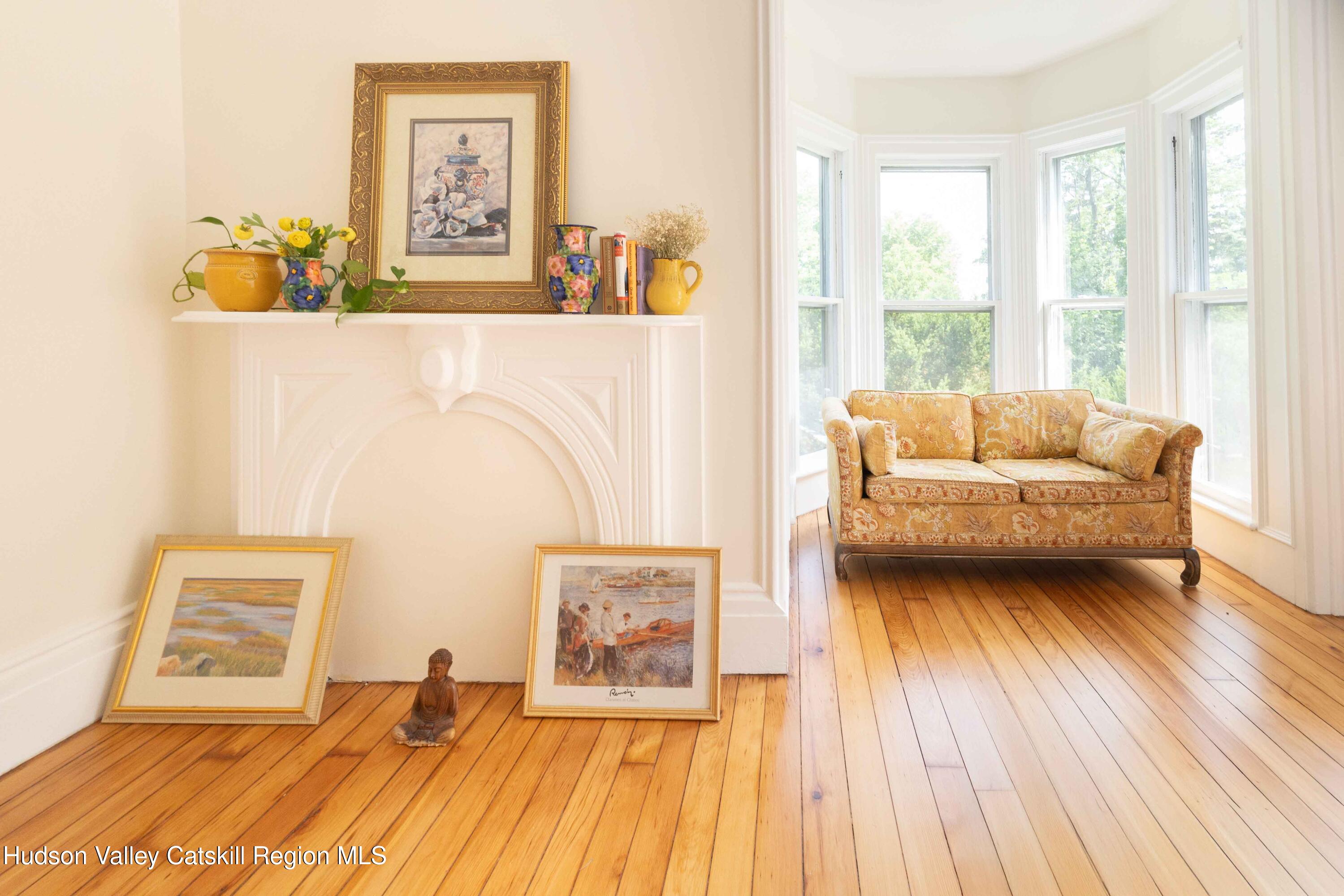 472 Lefever Falls Road Rosendale, NY 12401 - Photo 24 of 50 a living room with furniture and a wooden floor