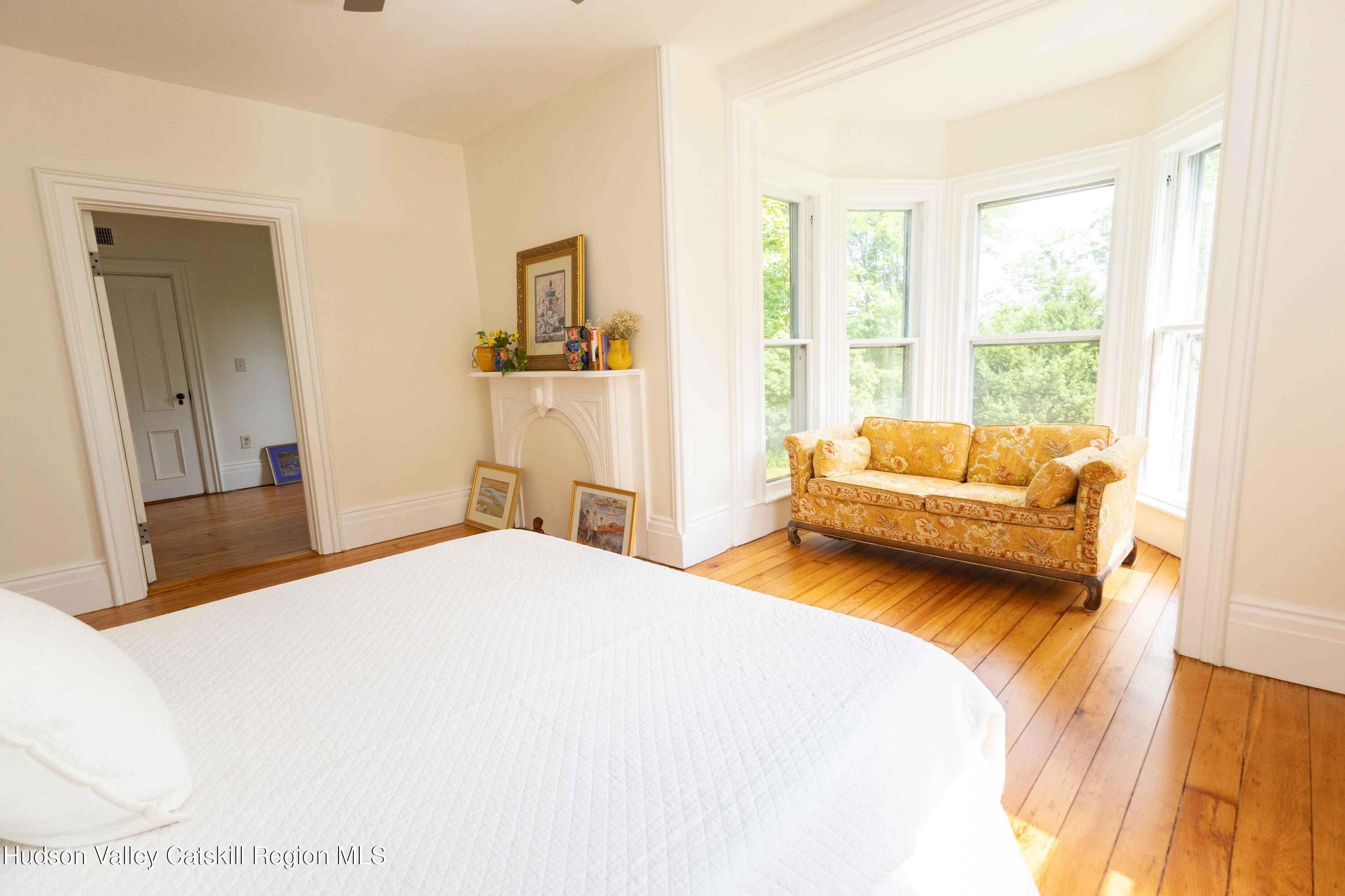 472 Lefever Falls Road Rosendale, NY 12401 - Photo 25 of 50 a bedroom with a bed and a couch