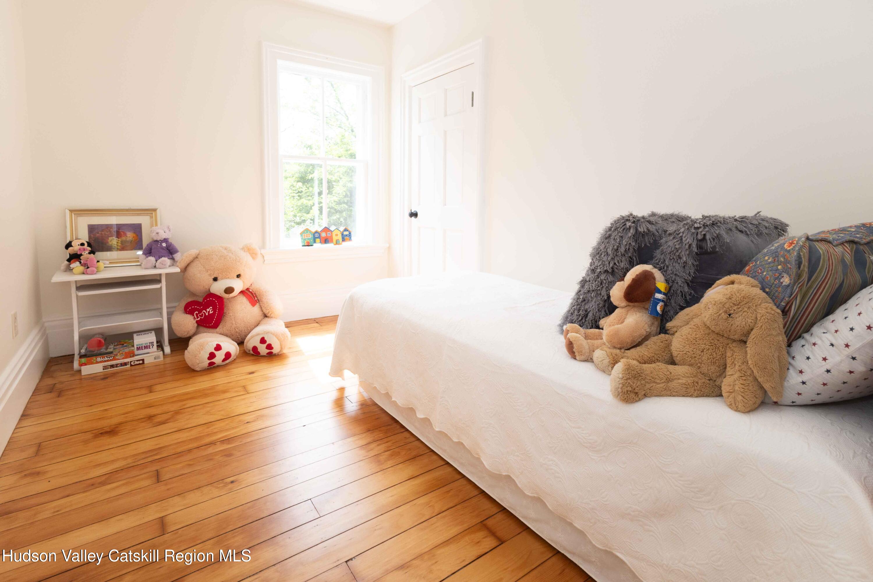 472 Lefever Falls Road Rosendale, NY 12401 - Photo 32 of 50 a bedroom with a bed and a window