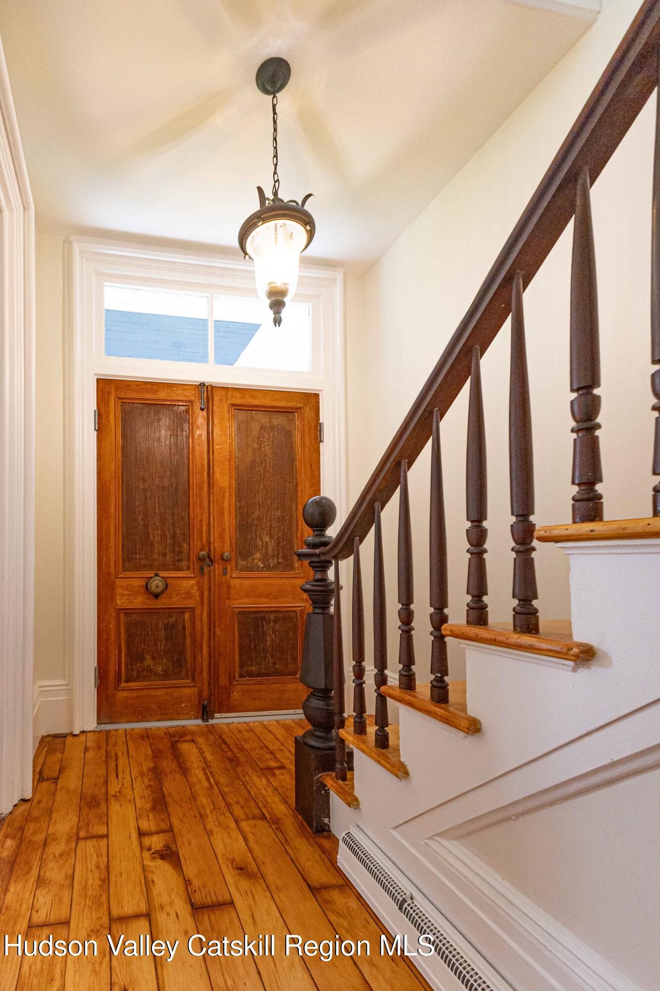 472 Lefever Falls Road Rosendale, NY 12401 - Photo 37 of 50 a view of a hallway with wooden floor and staircase