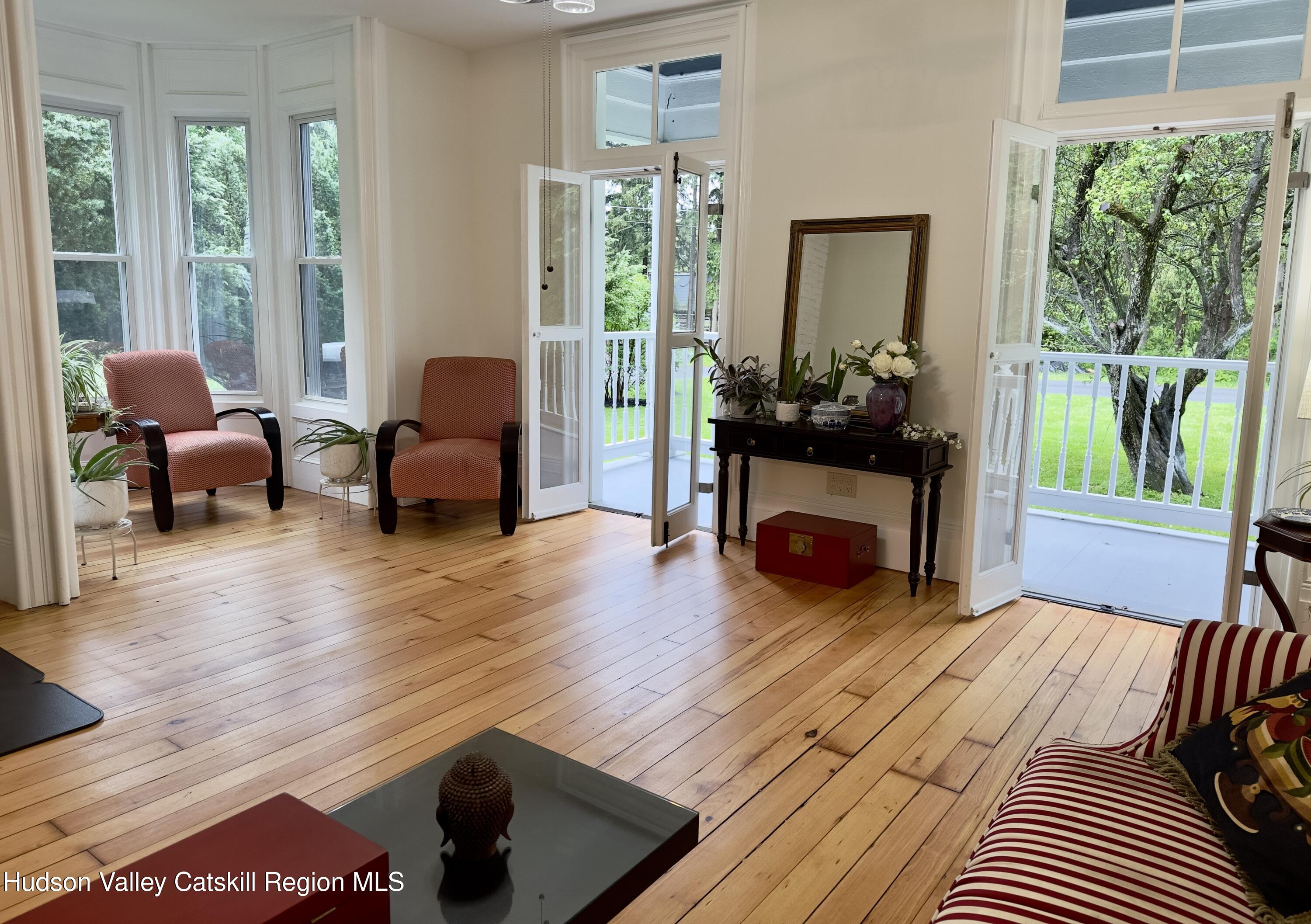 472 Lefever Falls Road Rosendale, NY 12401 - Photo 4 of 50 a living room with furniture and a fireplace