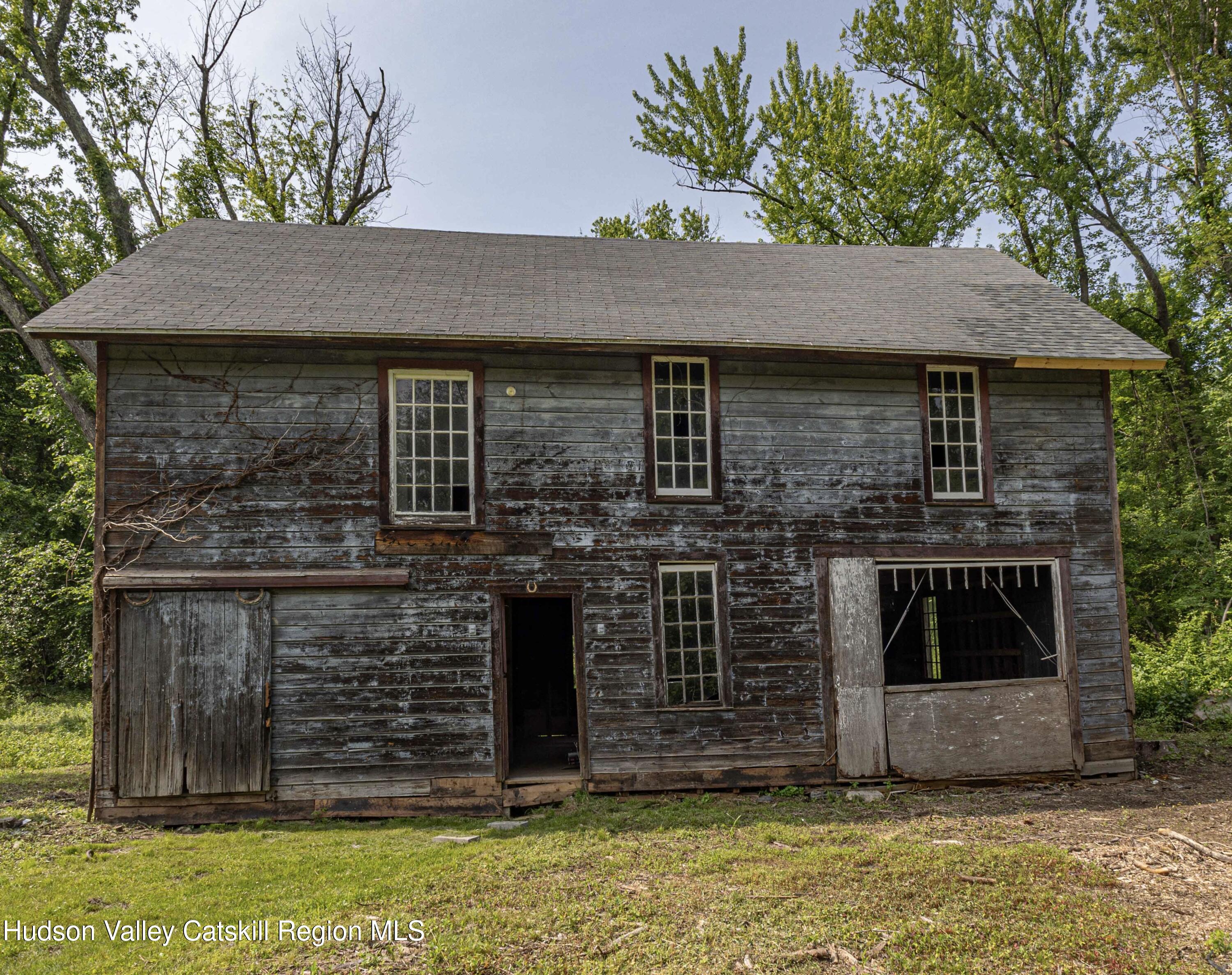 472 Lefever Falls Road Rosendale, NY 12401 - Photo 41 of 50 a front view of a house with a garden