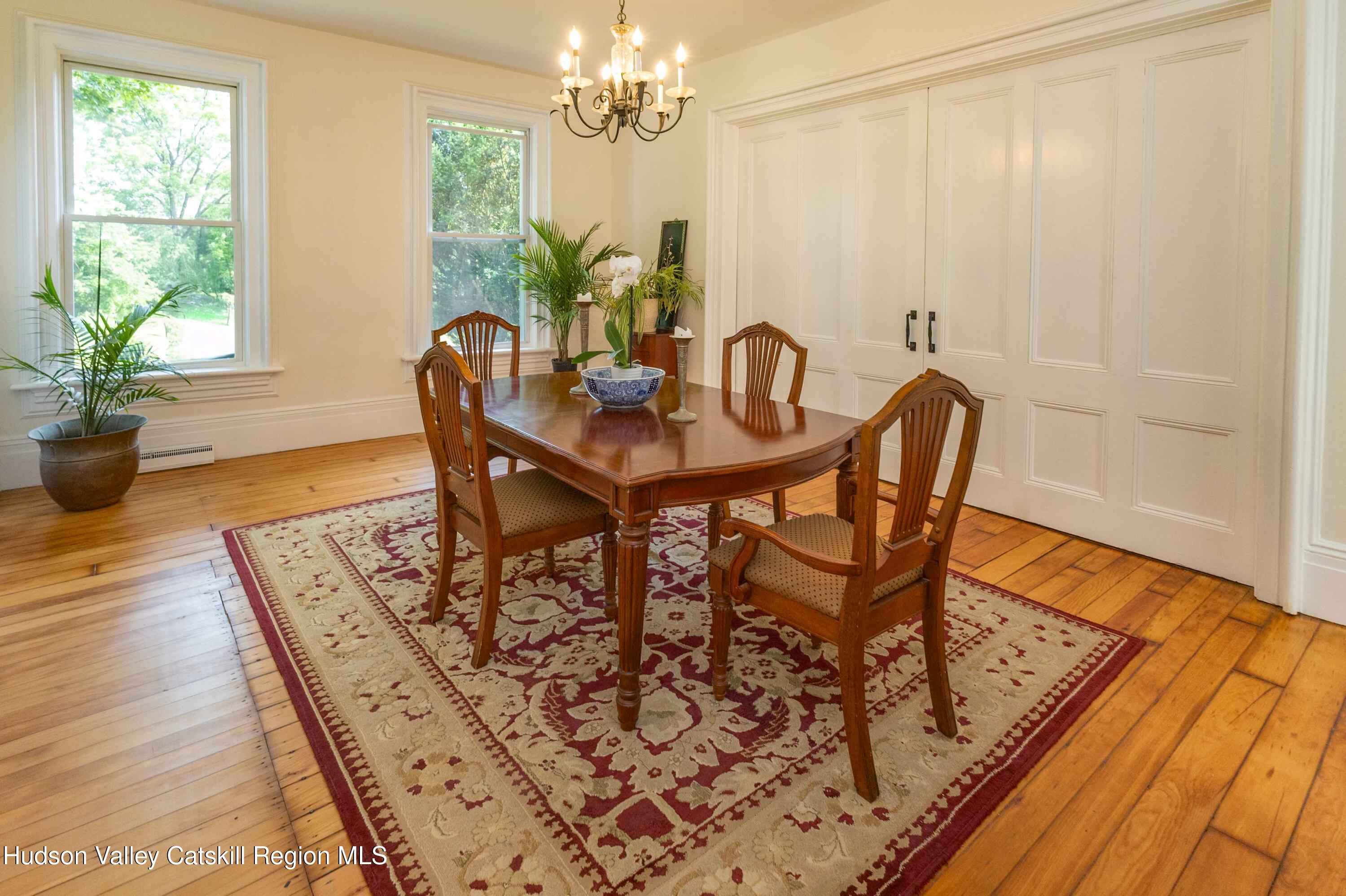 472 Lefever Falls Road Rosendale, NY 12401 - Photo 6 of 50 a view of a dining room with furniture and a window