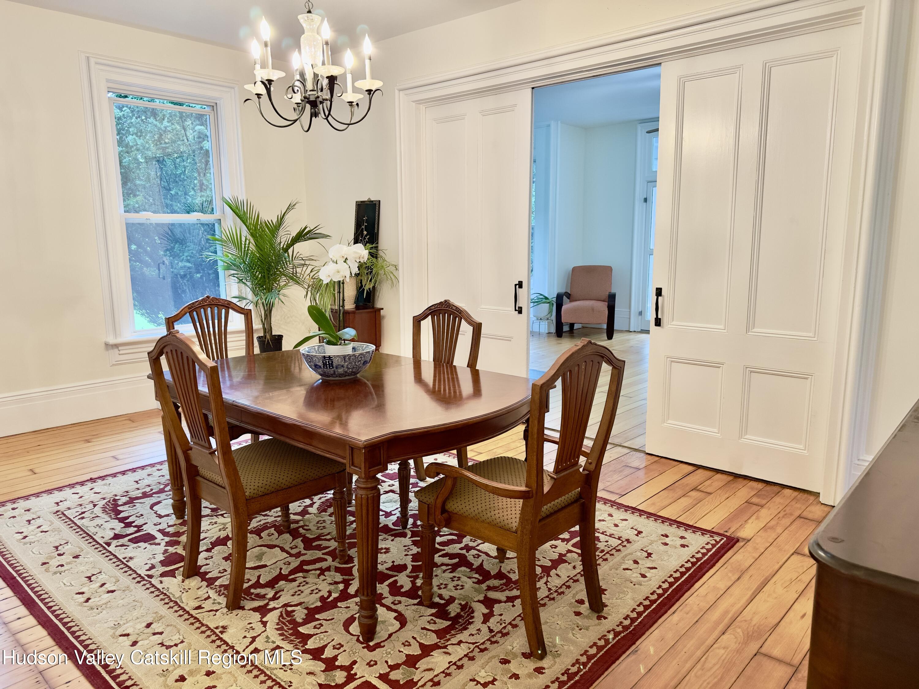472 Lefever Falls Road Rosendale, NY 12401 - Photo 7 of 50 a dining room with furniture and wooden floor