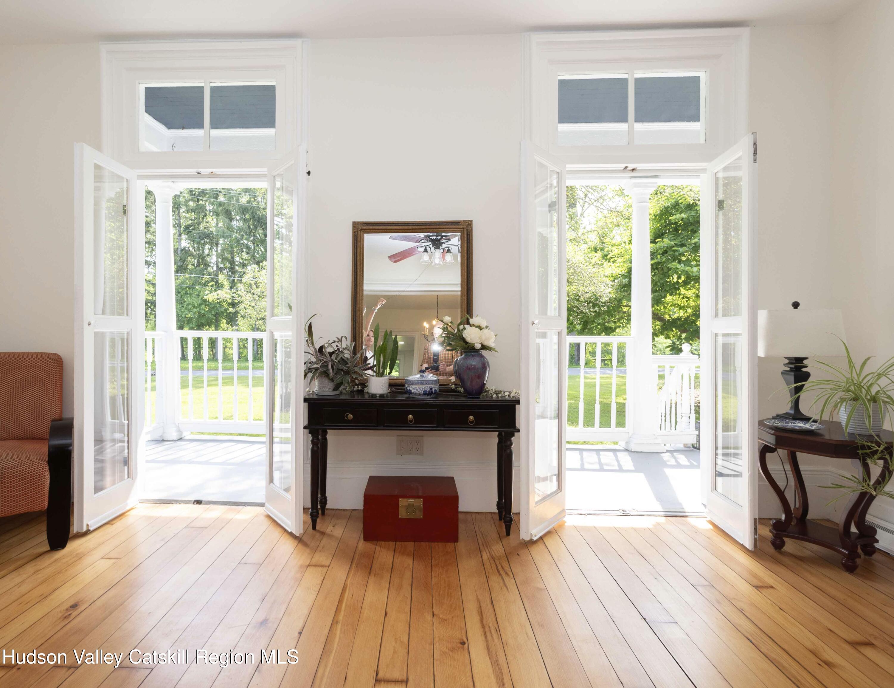 472 Lefever Falls Road Rosendale, NY 12401 - Photo 10 of 50 a living room with furniture and a fireplace