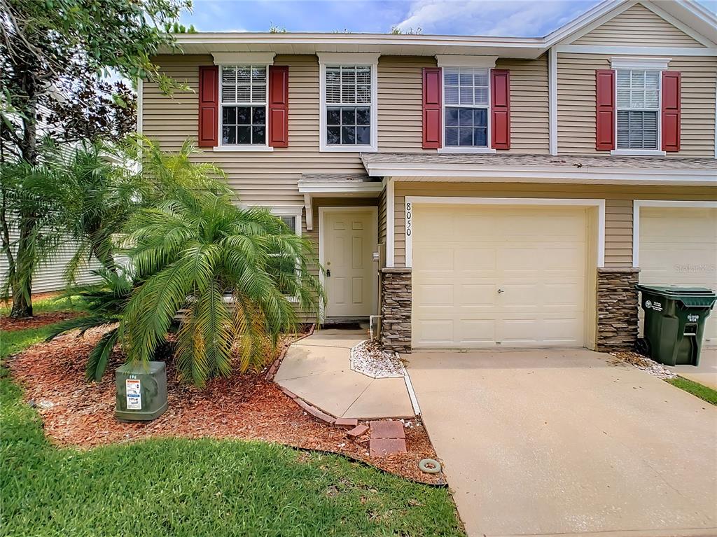 8050 Thoroughbred Loop Largo, FL 33773 - Photo 1 of 1 End unit on the back of the community