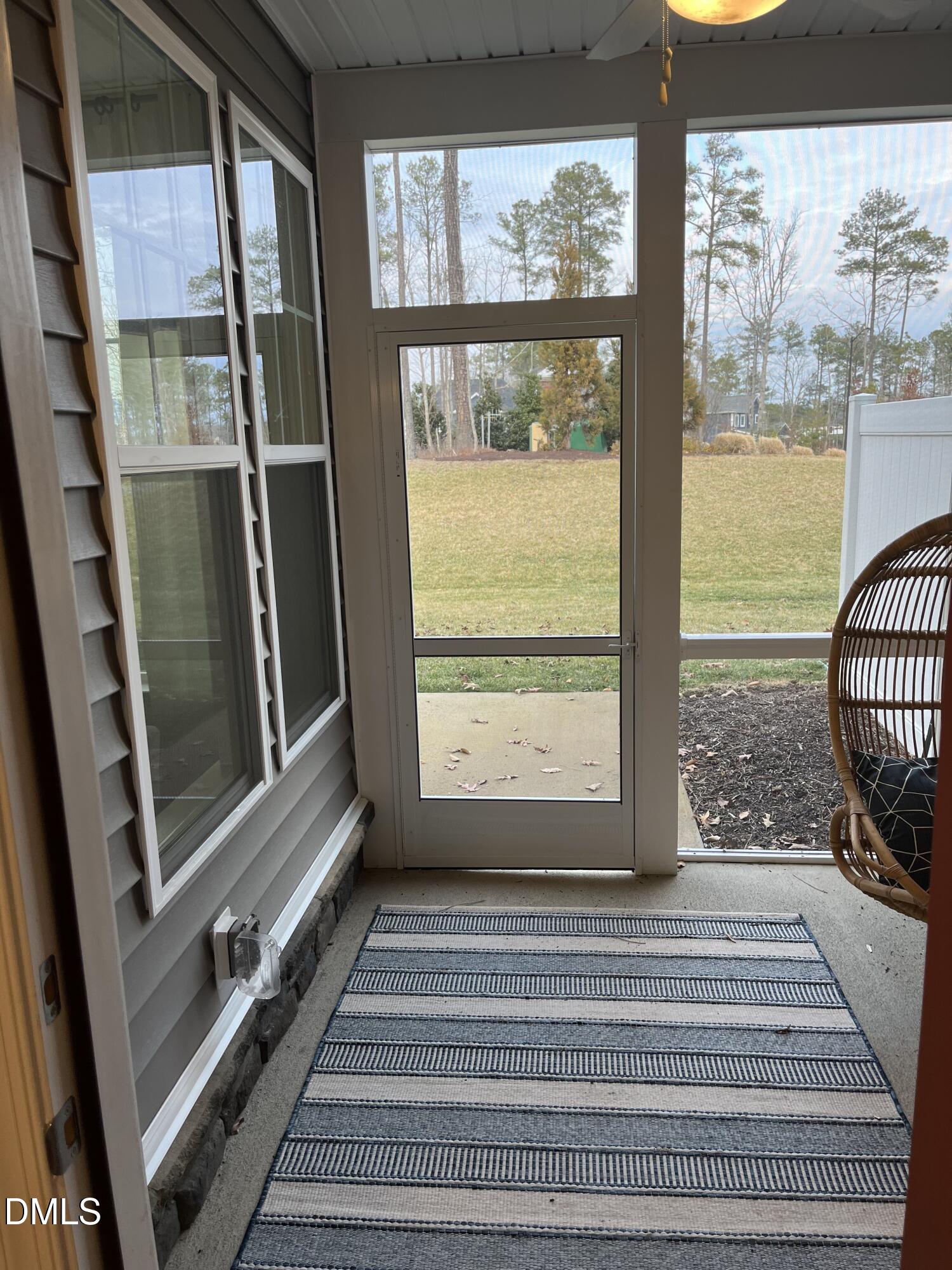 330 Short Ridge Way Rolesville, NC 27571 - Photo 8 of 24 a view of a room with wooden floor and windows