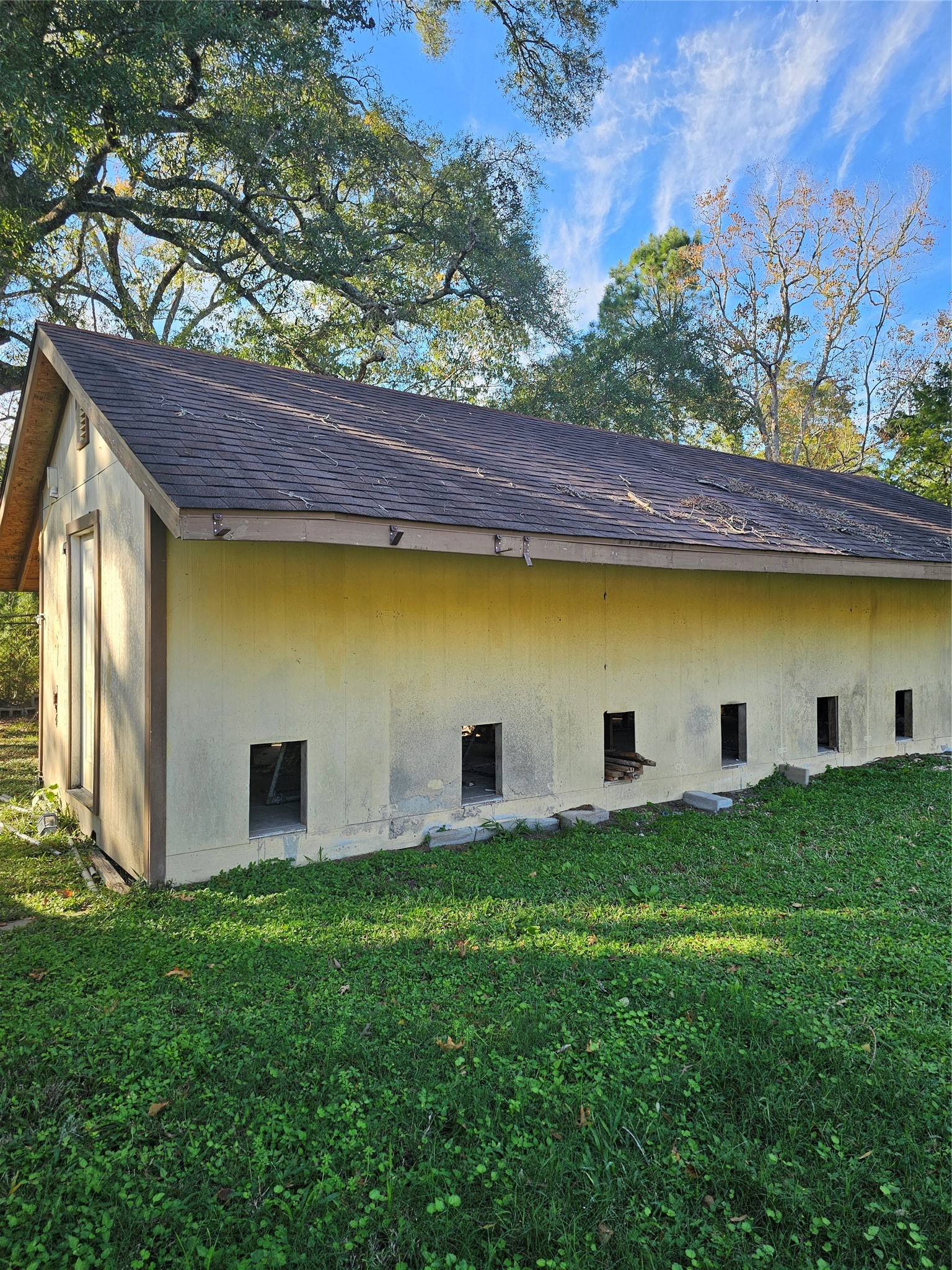 413 Speights Loop Road Hankamer, TX 77560 - Photo 2 of 4 a view of a yard with an outdoor space