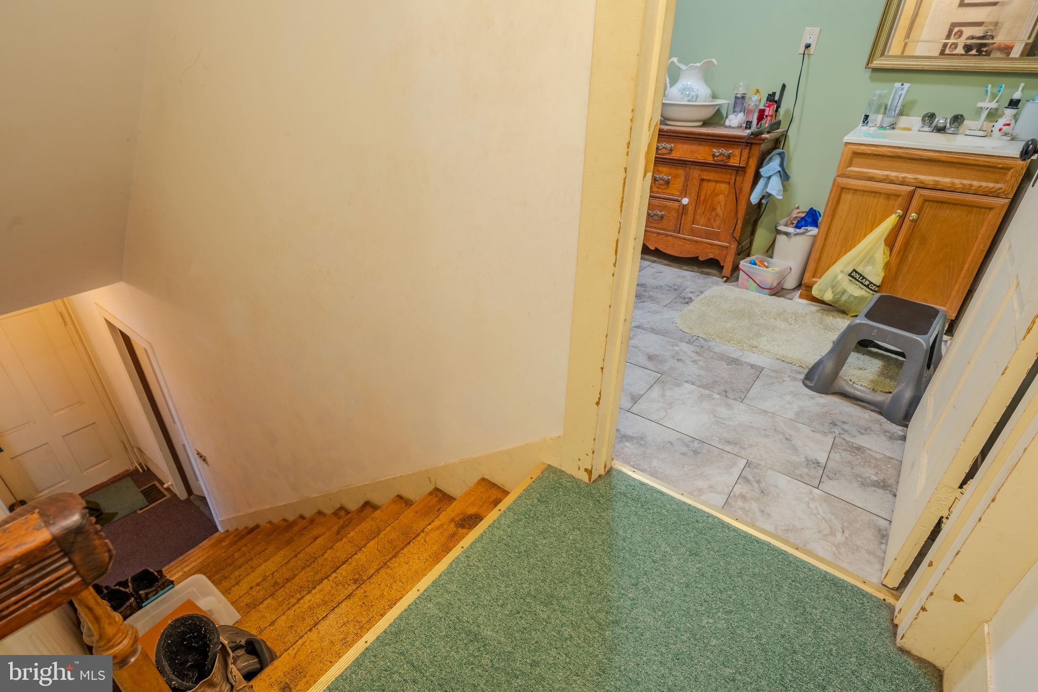1840 Masden Hollow Road Beech Creek, PA 16822 - Photo 17 of 66 a bathroom with a sink and a mirror