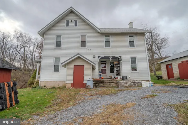 a front view of house with yard