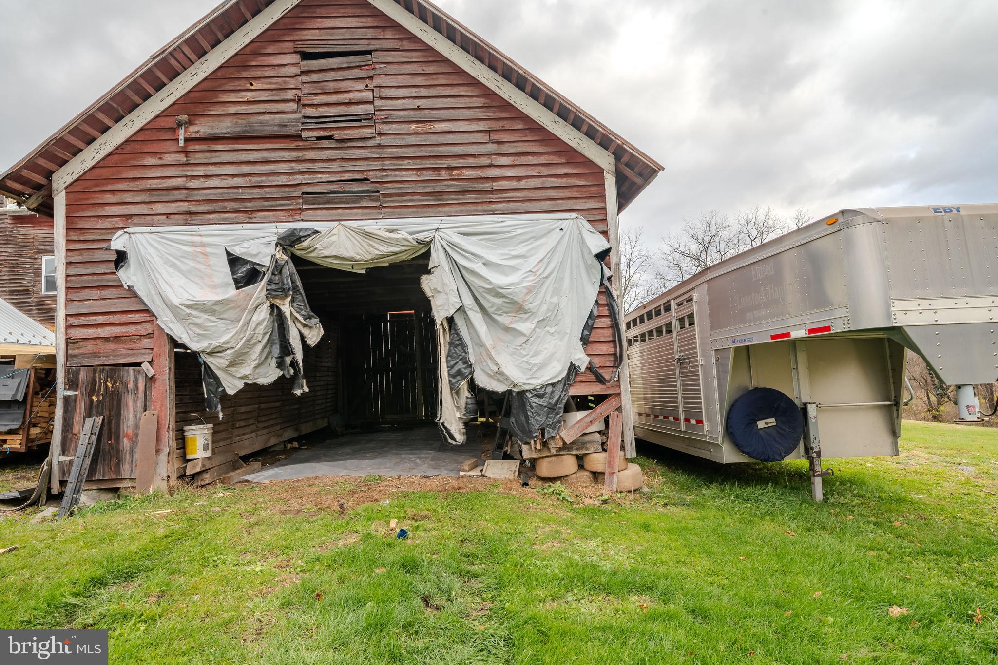 1840 Masden Hollow Road Beech Creek, PA 16822 - Photo 24 of 66 a view of a house with a backyard
