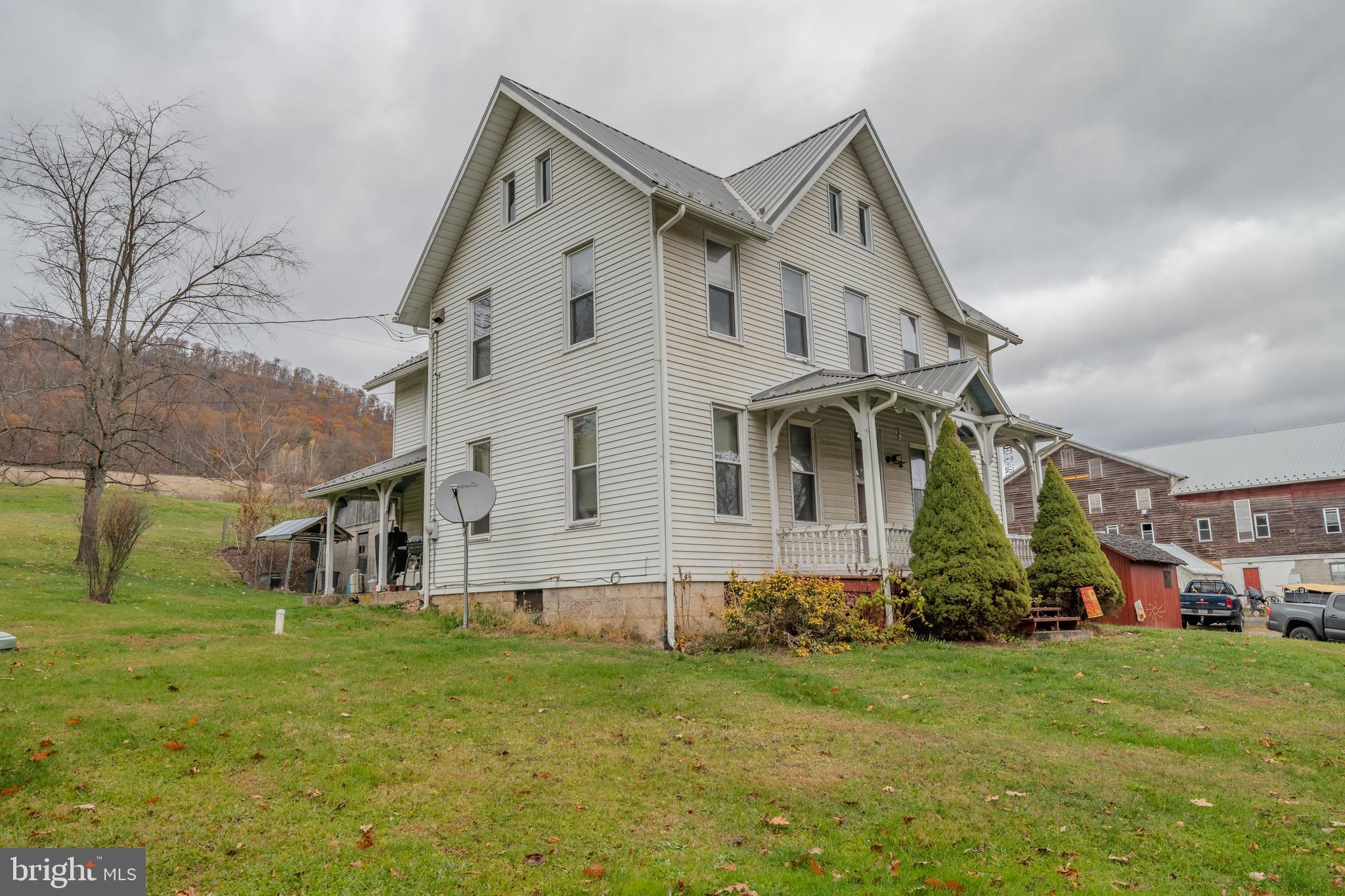 1840 Masden Hollow Road Beech Creek, PA 16822 - Photo 26 of 66 a front view of house with yard