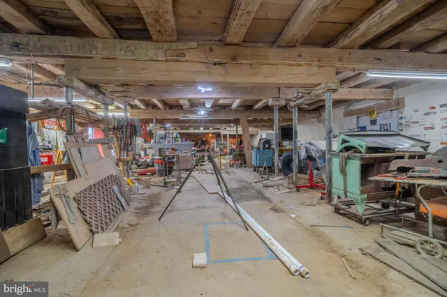 an aerial view of a house with a garden