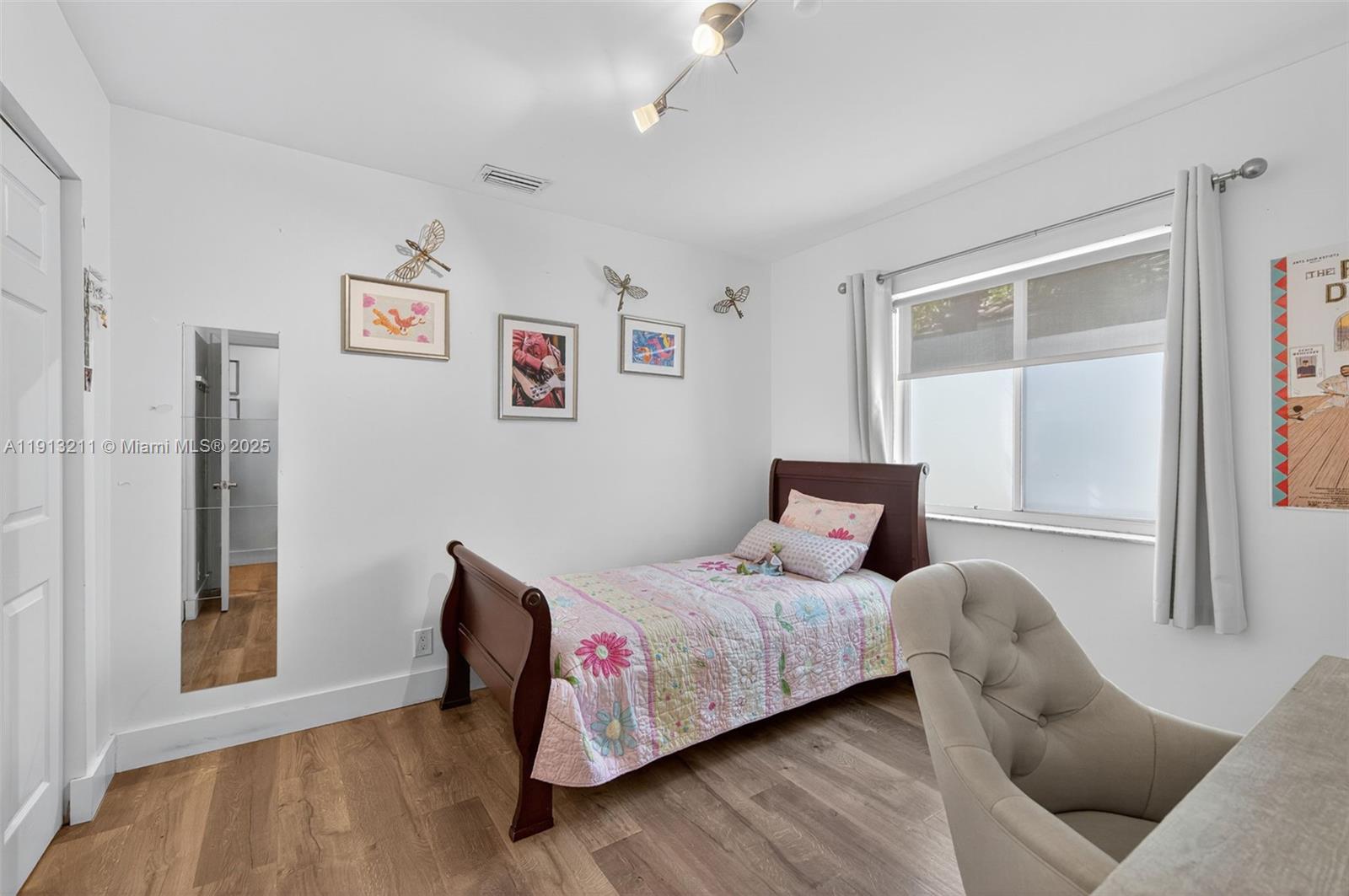 4357 Magnolia Ridge Drive Weston, FL 33331 - Photo 22 of 54 a bedroom with a bed and a couch