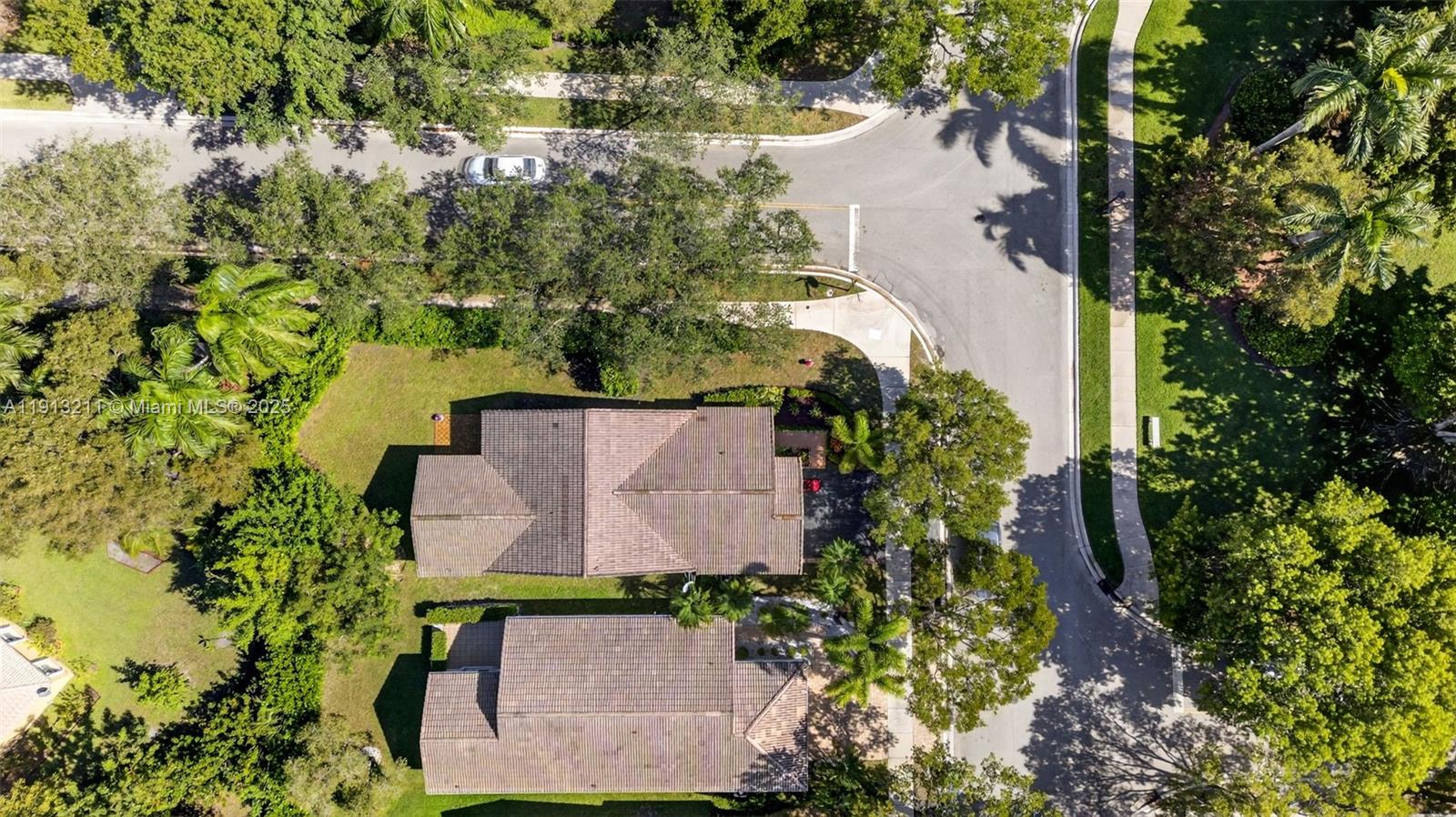 4357 Magnolia Ridge Drive Weston, FL 33331 - Photo 34 of 54 an aerial view of residential house with outdoor space and trees all around