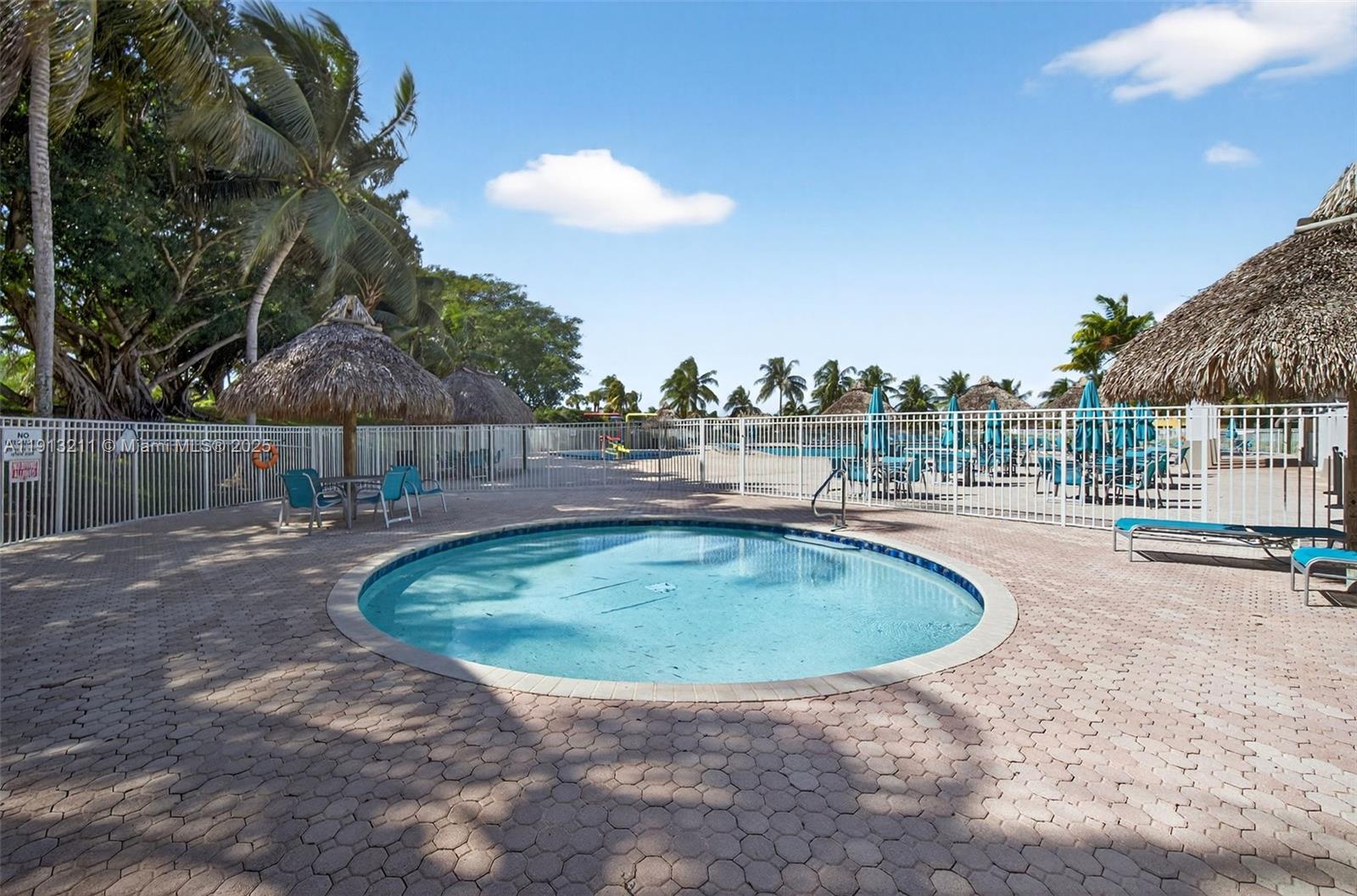 4357 Magnolia Ridge Drive Weston, FL 33331 - Photo 42 of 54 a view of outdoor space yard swimming pool and outdoor seating