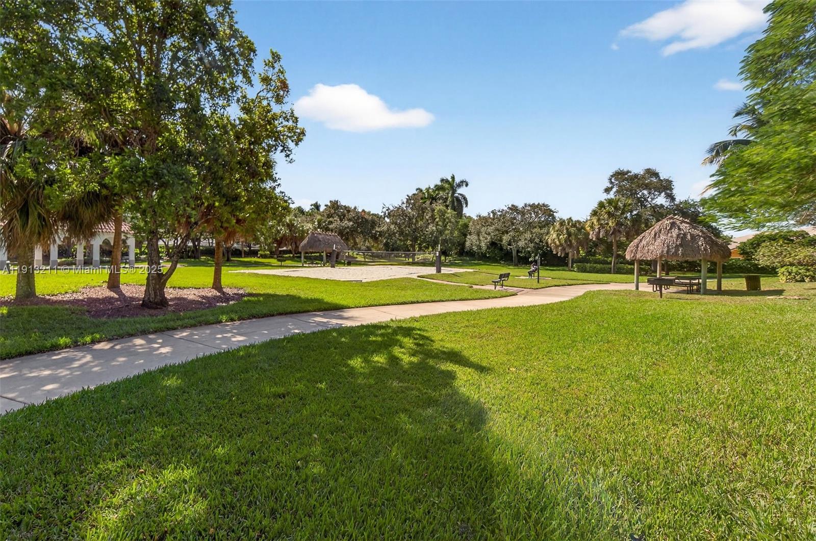 4357 Magnolia Ridge Drive Weston, FL 33331 - Photo 46 of 54 a view of outdoor space with garden and trees