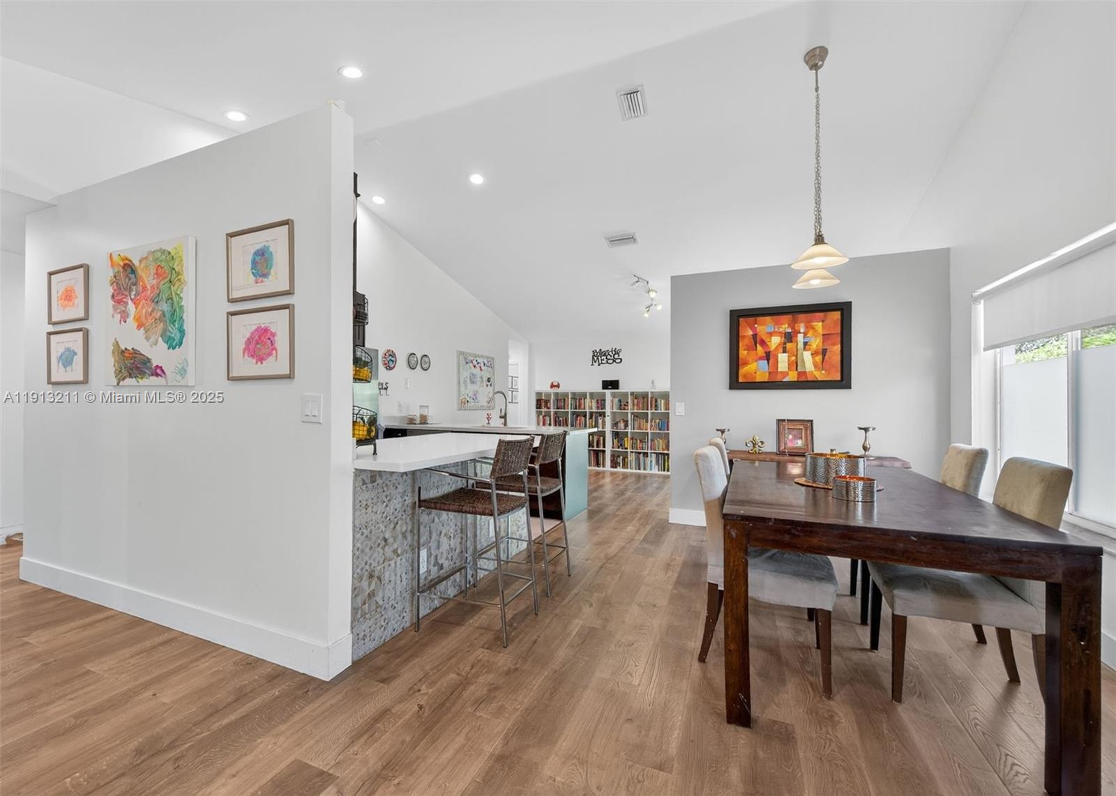 4357 Magnolia Ridge Drive Weston, FL 33331 - Photo 6 of 54 a view of a dining room with furniture and wooden floor