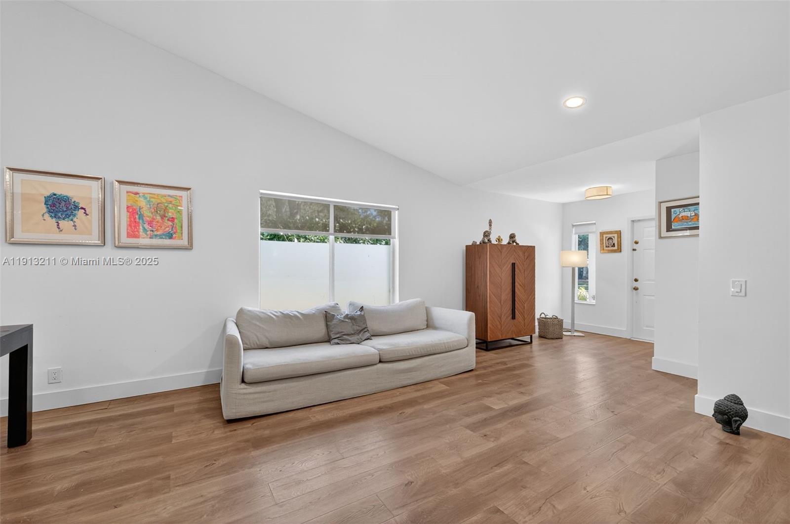 4357 Magnolia Ridge Drive Weston, FL 33331 - Photo 8 of 54 a living room with furniture and a couch