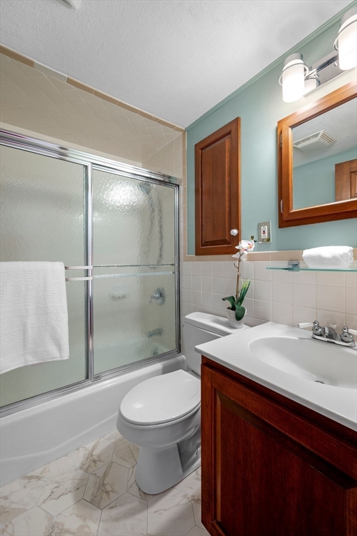 154 R Eastern Avenue Essex, MA 01929 - Photo 17 of 40 a bathroom with a sink a toilet and shower