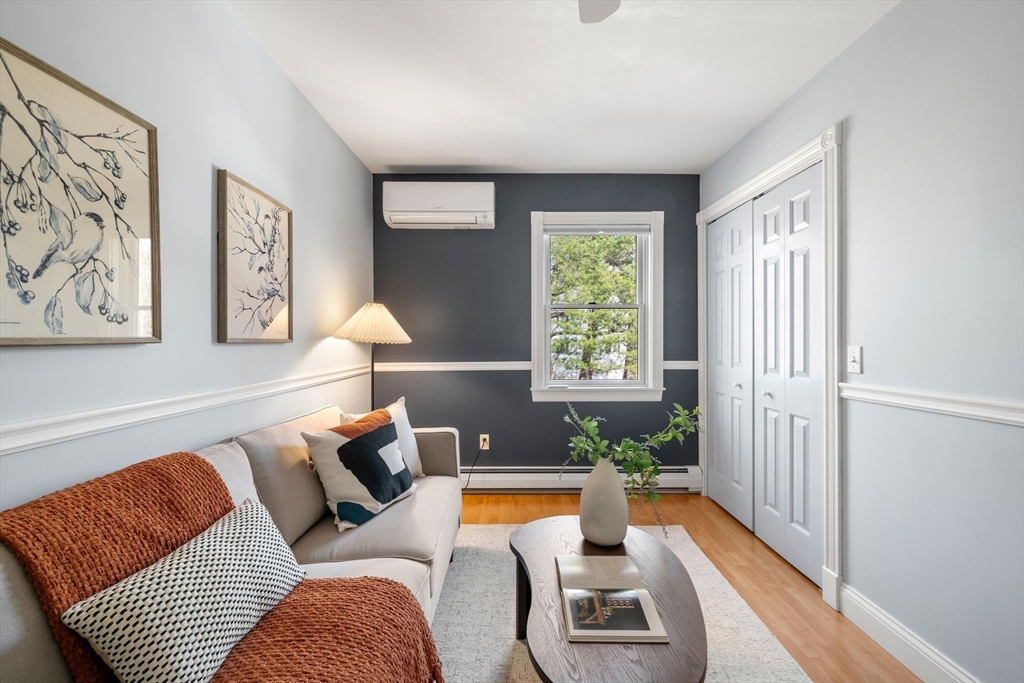 154 R Eastern Avenue Essex, MA 01929 - Photo 22 of 40 a living room with furniture and a window