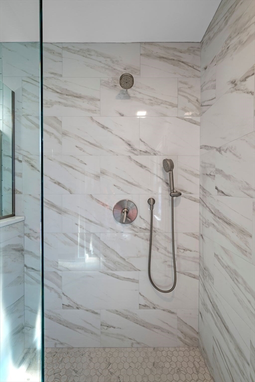 154 R Eastern Avenue Essex, MA 01929 - Photo 24 of 40 a bathroom with a glass shower door