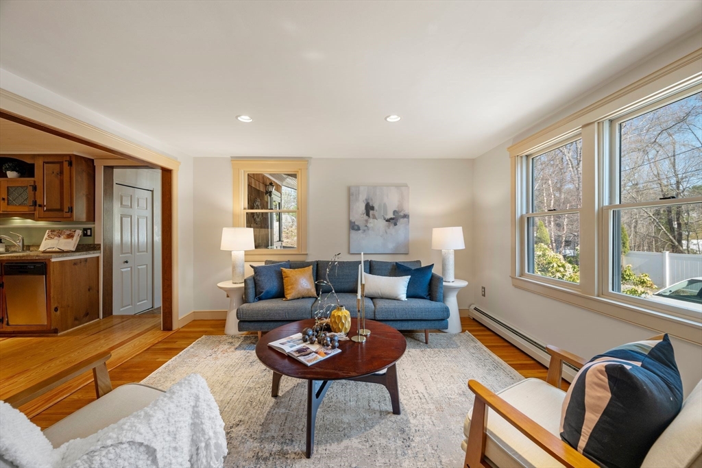 154 R Eastern Avenue Essex, MA 01929 - Photo 3 of 40 a living room with furniture and a window