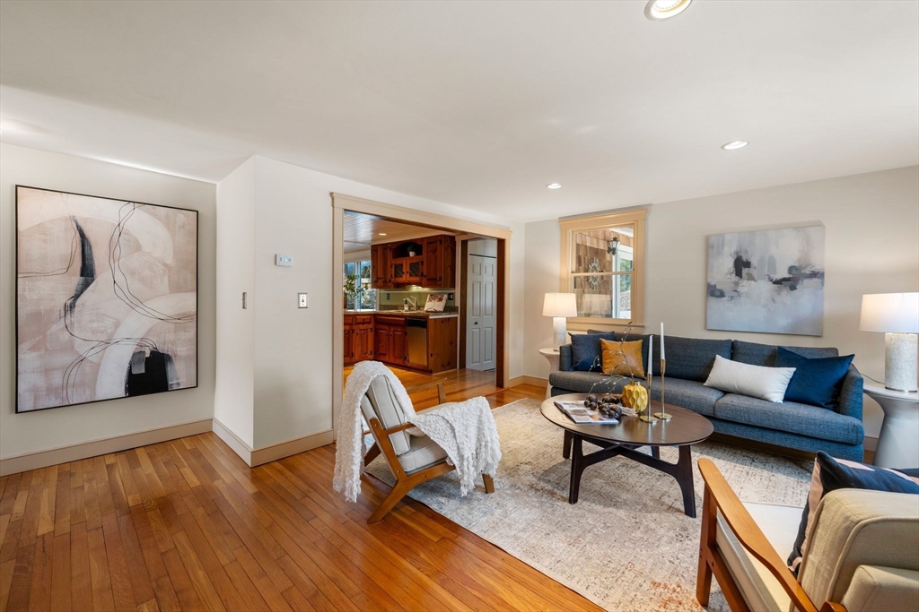 154 R Eastern Avenue Essex, MA 01929 - Photo 5 of 40 a living room with furniture and a wooden floor