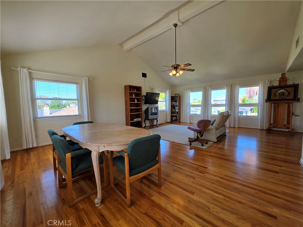 11541 Donovan Road Rossmoor, CA 90720 - Photo 32 of 51 Vaulted bonus room with ceiling fan and 3 walls of windows