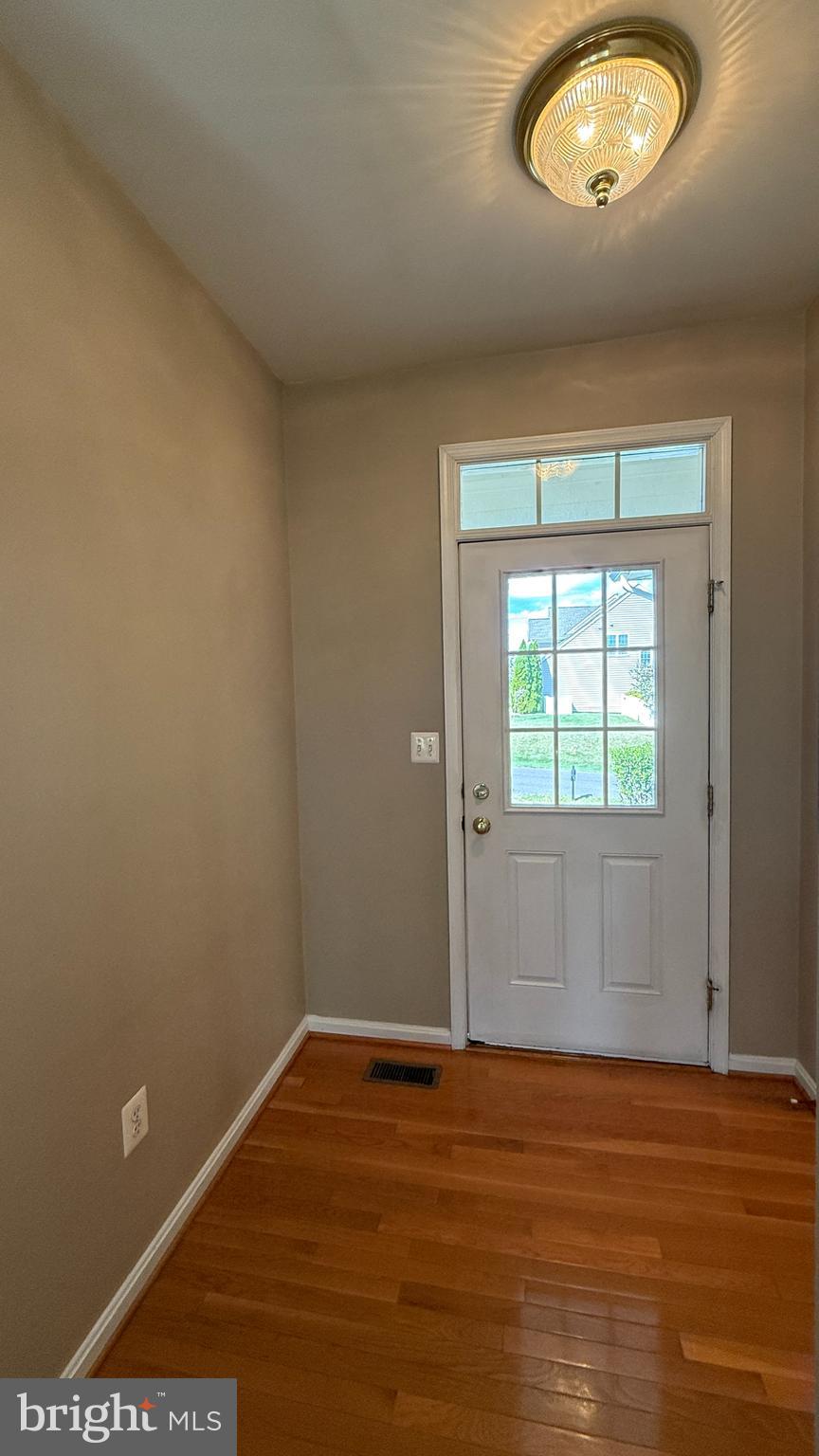 35484 Somerset Ridge Road Locust Grove, VA 22508 - Photo 2 of 22 an empty room with wooden floor and windows