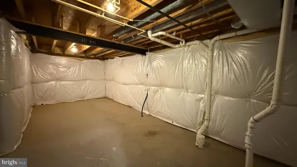 a view of a room with racks on the wall