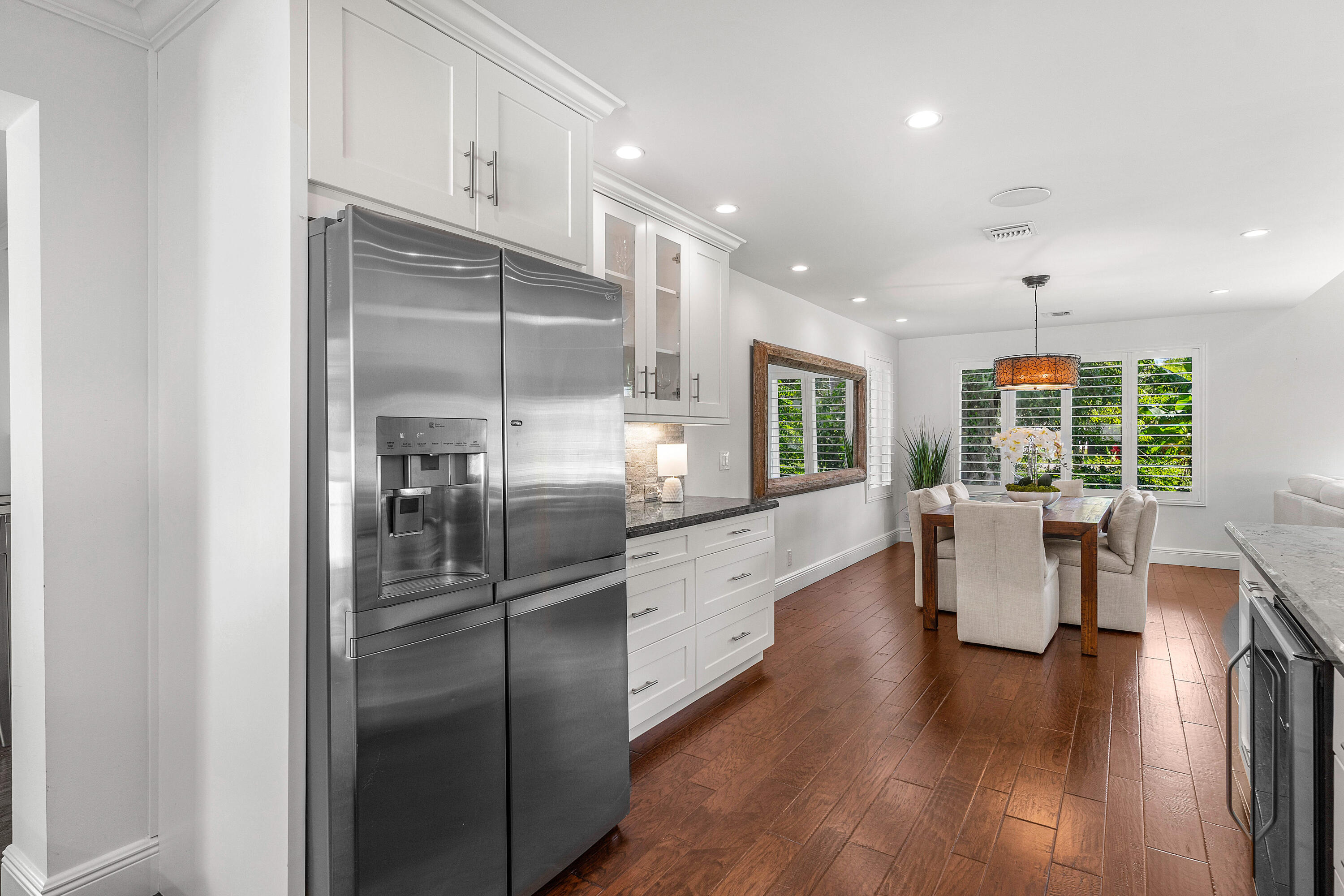 6130 Ridge Lane Ocean Ridge, FL 33435 - Photo 10 of 30 Kitchen Opens to Dining Room