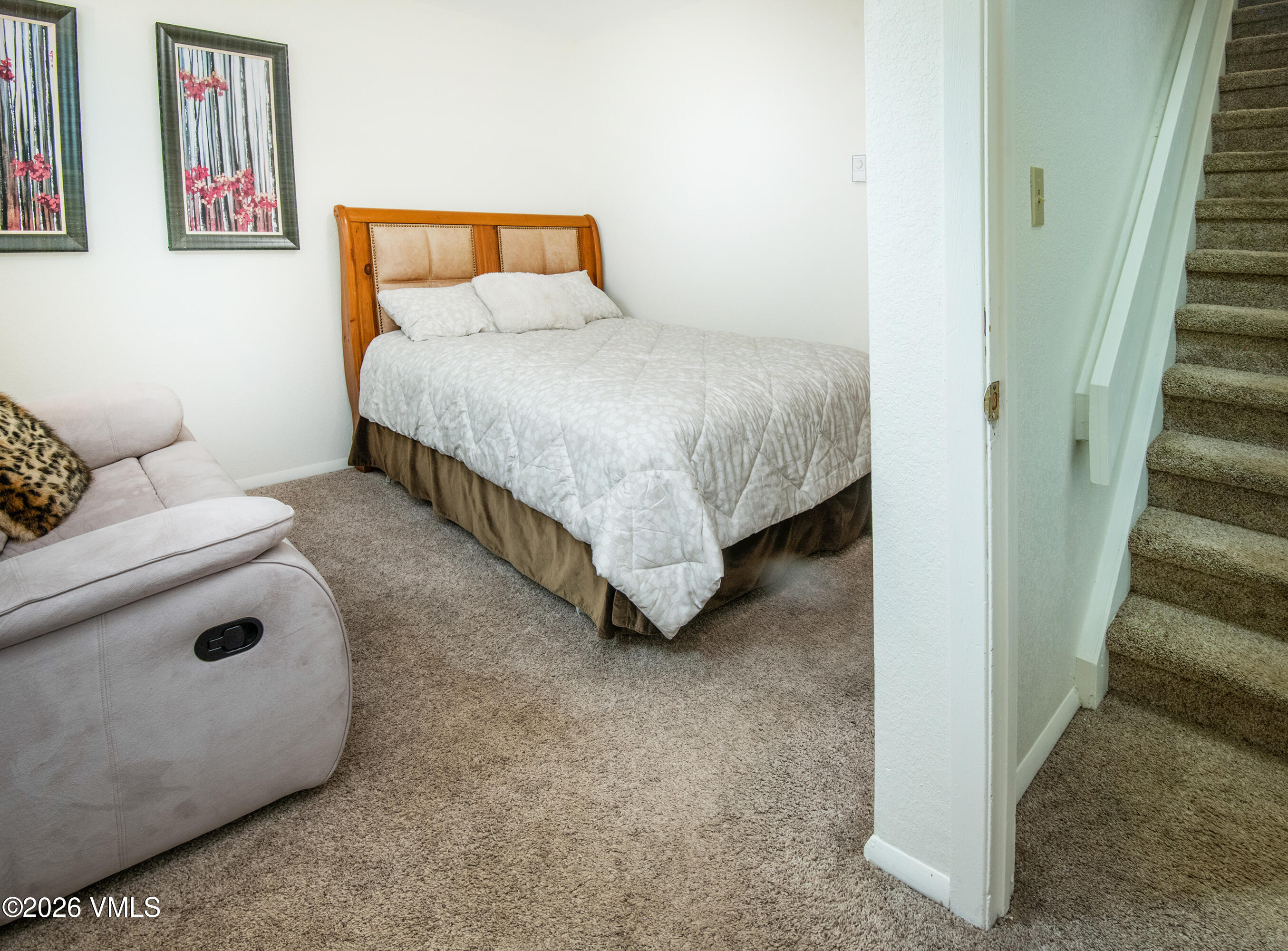 85 Chambers Avenue, Unit 10 Eagle, CO 81631 - Photo 20 of 41 a bedroom with a bed and a cabinets