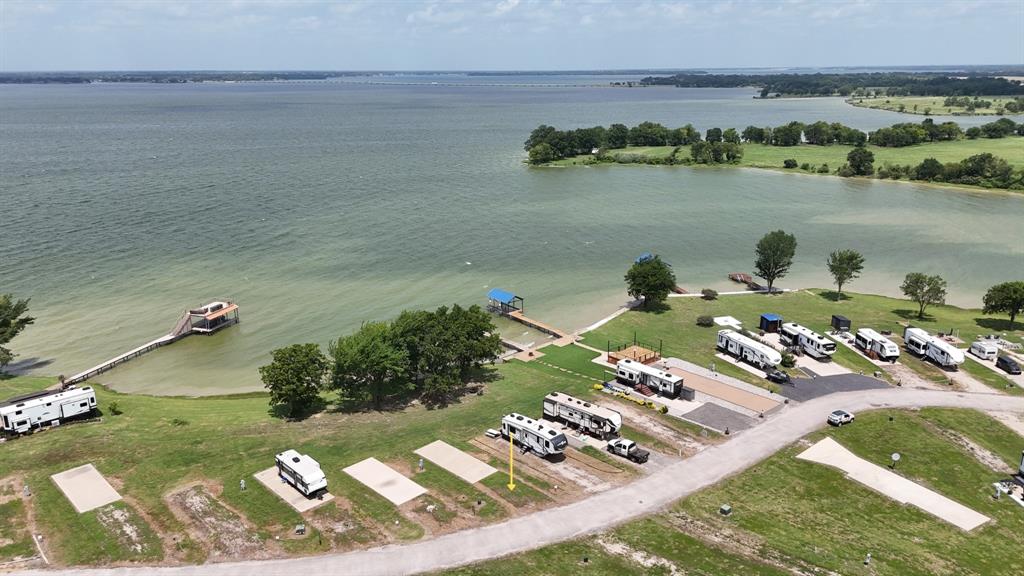 5136 Peninsula Road Kerens, TX 75144 - Photo 21 of 40 Bird’s-eye view of the RV community and shoreline.