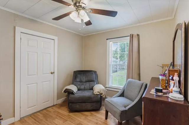a living room with furniture and a window