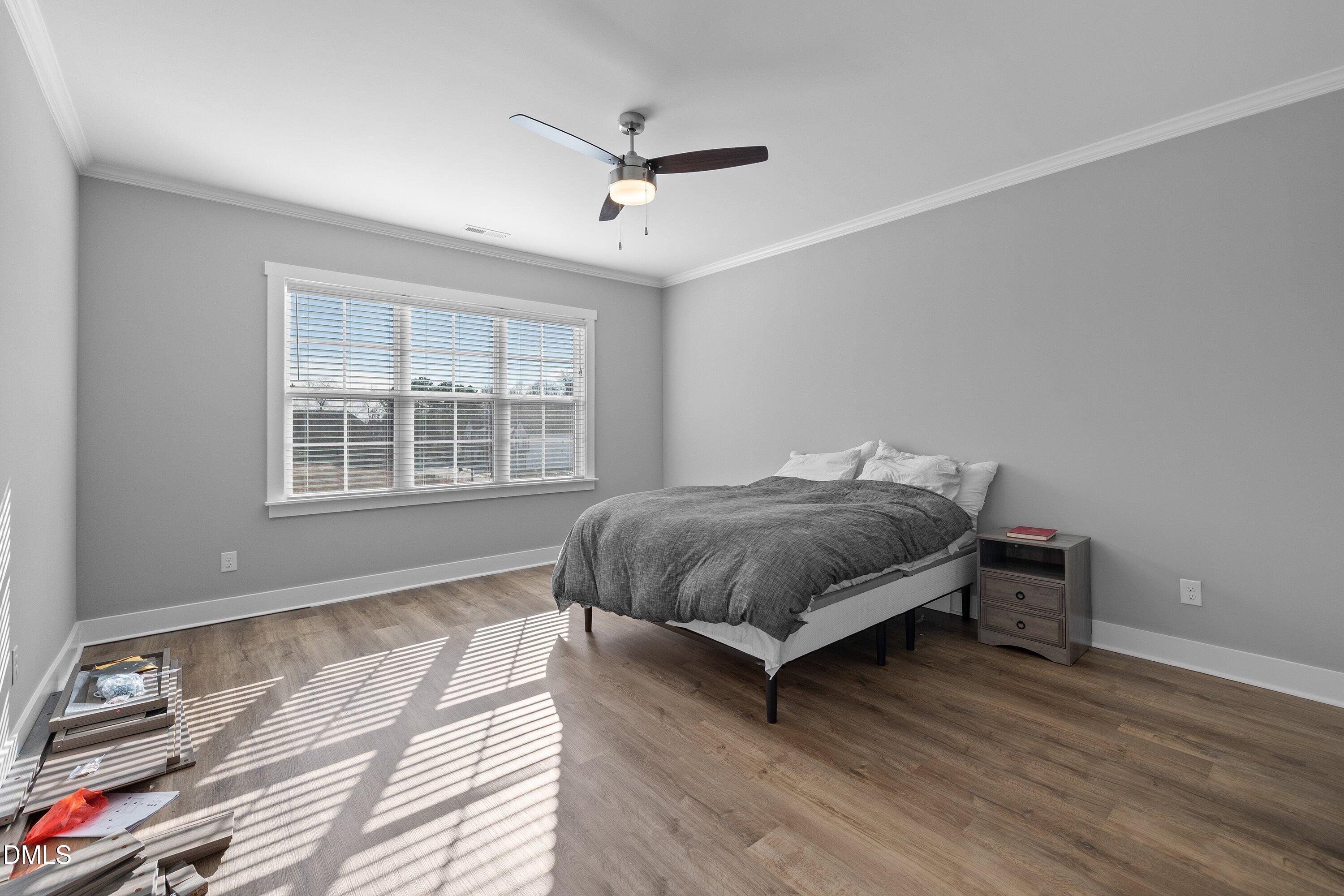 718 Jamescroft Way Rolesville, NC 27571 - Photo 24 of 40 a bedroom with a bed and window