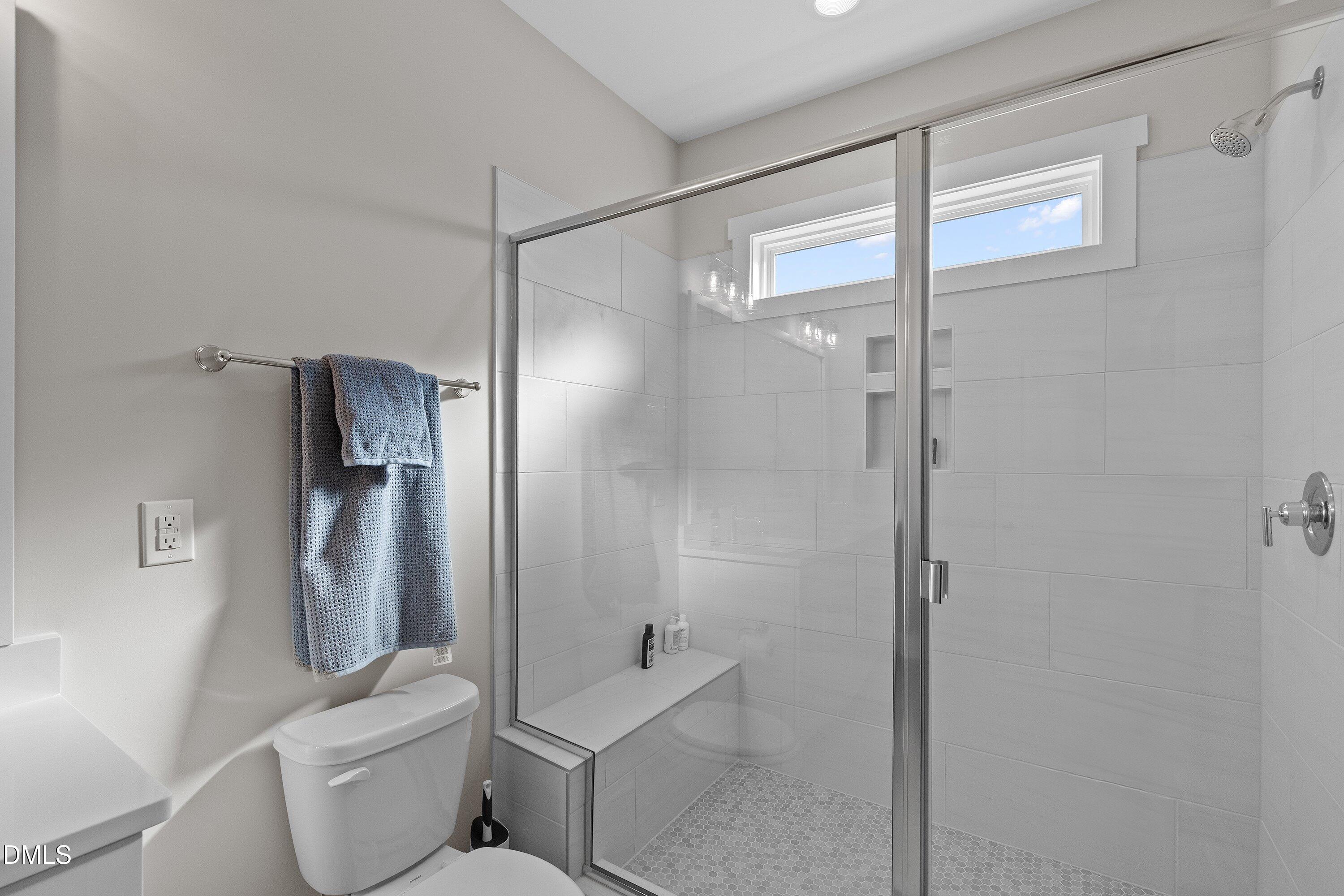 718 Jamescroft Way Rolesville, NC 27571 - Photo 28 of 40 a bathroom with a toilet and a shower