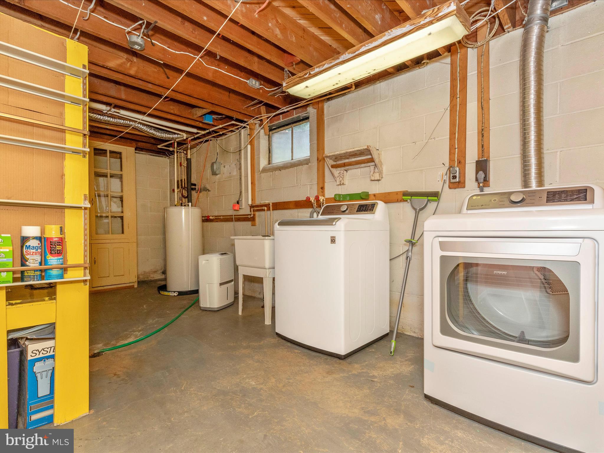 9104 Gue Road Damascus, MD 20872 - Photo 33 of 45 lower level laundry with storage
